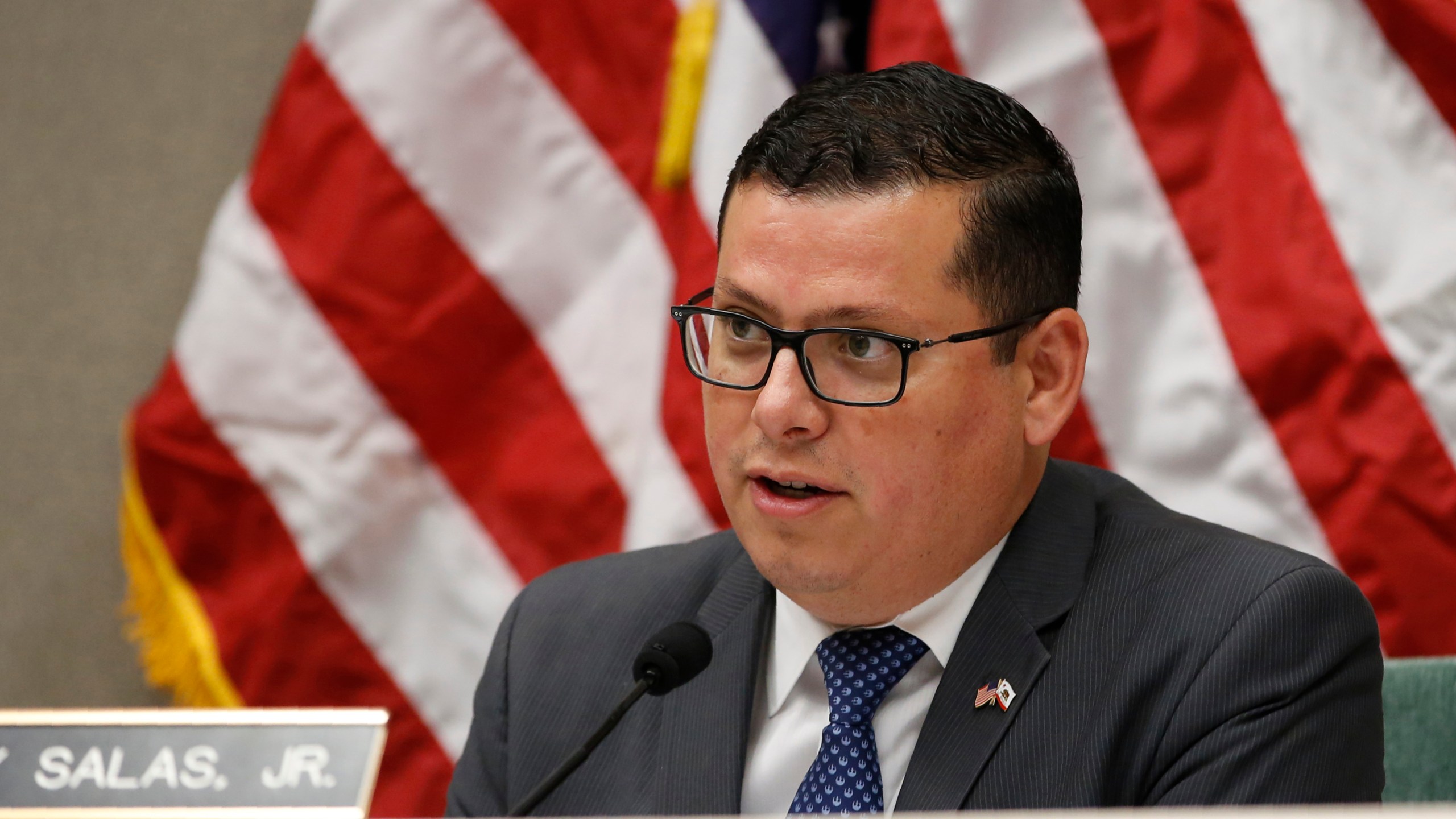 FILE - Assemblyman Rudy Salas Jr., asks questions during a hearing in Sacramento, Calif., Aug. 12, 2019. (AP Photo/Rich Pedroncelli, File)