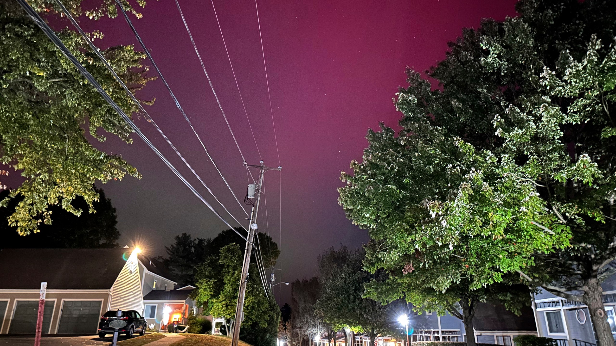 An aurora borealis, also known as the northern lights, shines over Portsmouth, N.H., Thursday, Oct. 10, 2024. (AP Photo/Caleb Jones)