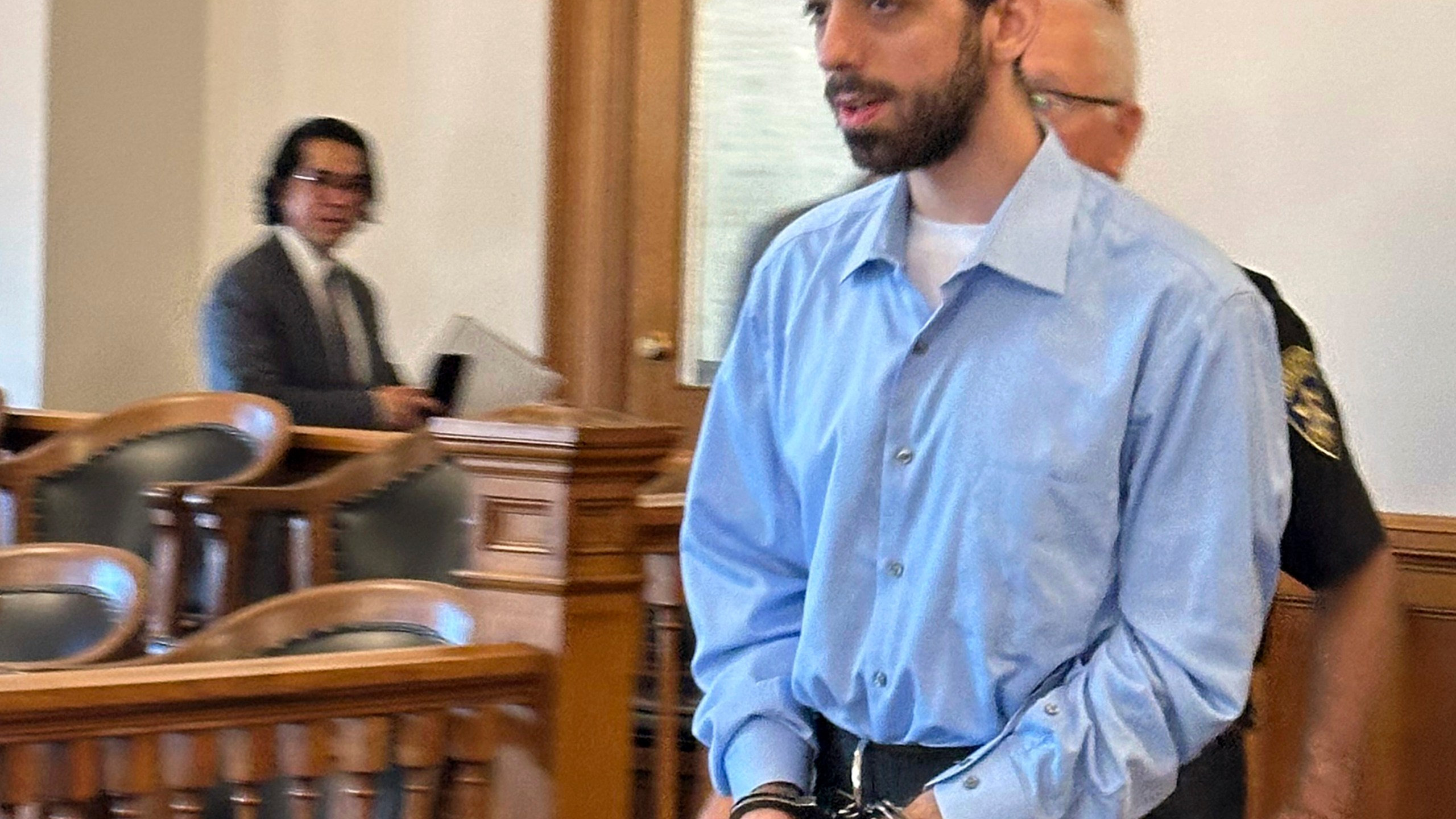 Had Matar, charged with attempted murder for stabbing author Salman Rushdie more than a dozen times, is escorted into the courtroom for a hearing in Chautauqua County Court, Friday, Oct. 4, 2024, in Mayville, N.Y. (AP Photo/Carolyn Thompson)