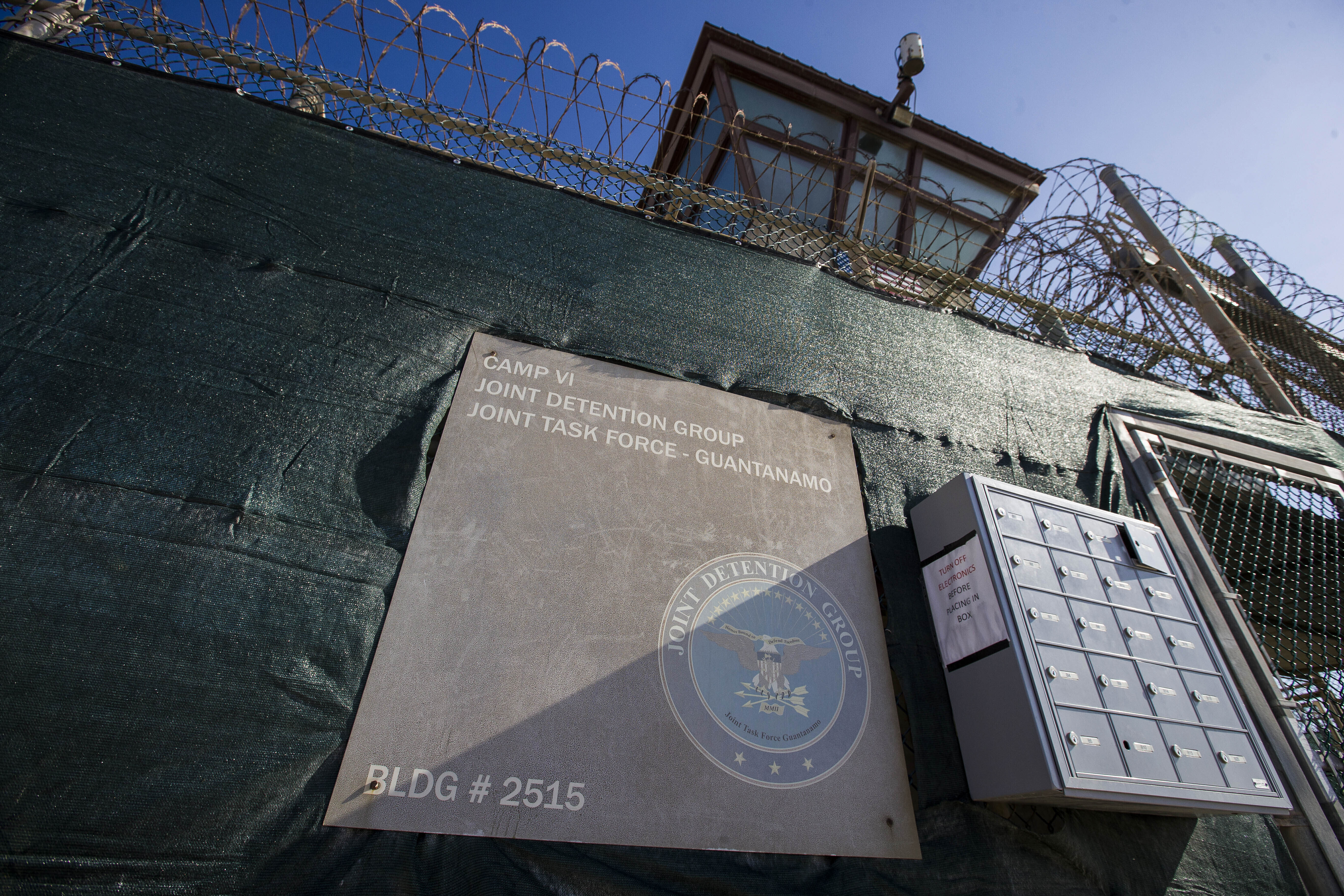 FILE - In this photo reviewed by U.S. military officials, the control tower of Camp VI detention facility is seen on April 17, 2019, in Guantanamo Bay Naval Base, Cuba. (AP Photo/Alex Brandon, File)