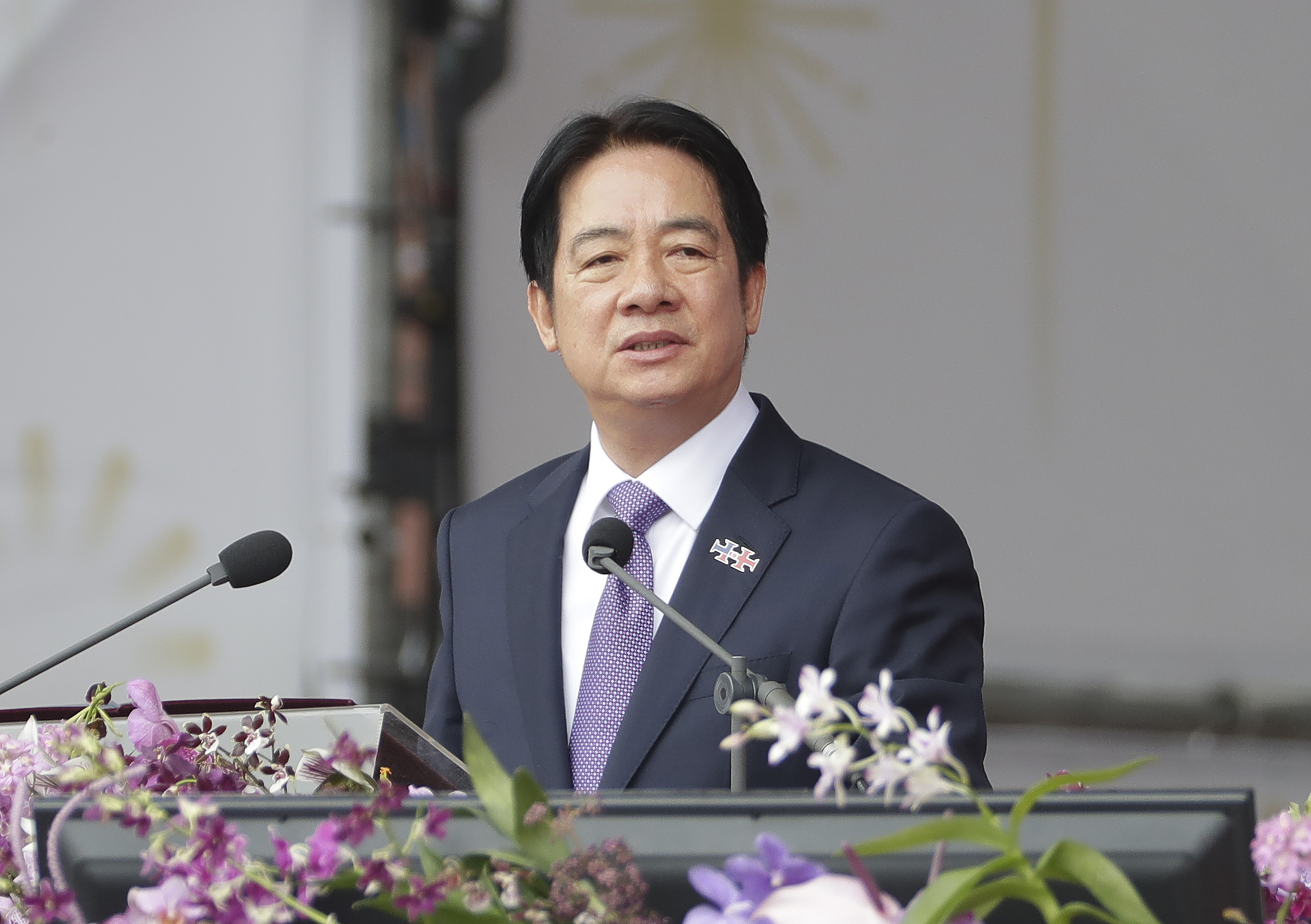 Taiwanese President Lai Ching-te delivers a speech during National Day celebrations in front of the Presidential Building in Taipei, Taiwan, Thursday, Oct. 10, 2024. (AP Photo/Chiang Ying-ying)