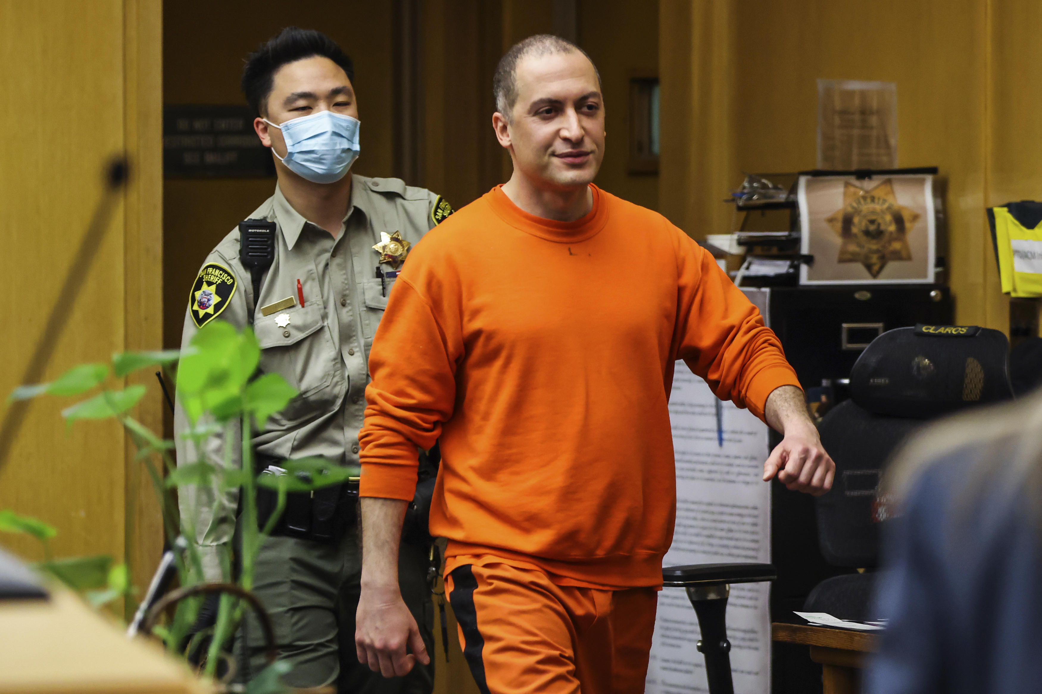 FILE - Nima Momeni, the man charged in the fatal stabbing of Cash App founder Bob Lee, makes his way into the courtroom for his arraignment in San Francisco, May 2, 2023. (Gabrielle Lurie/San Francisco Chronicle via AP, Pool, File)