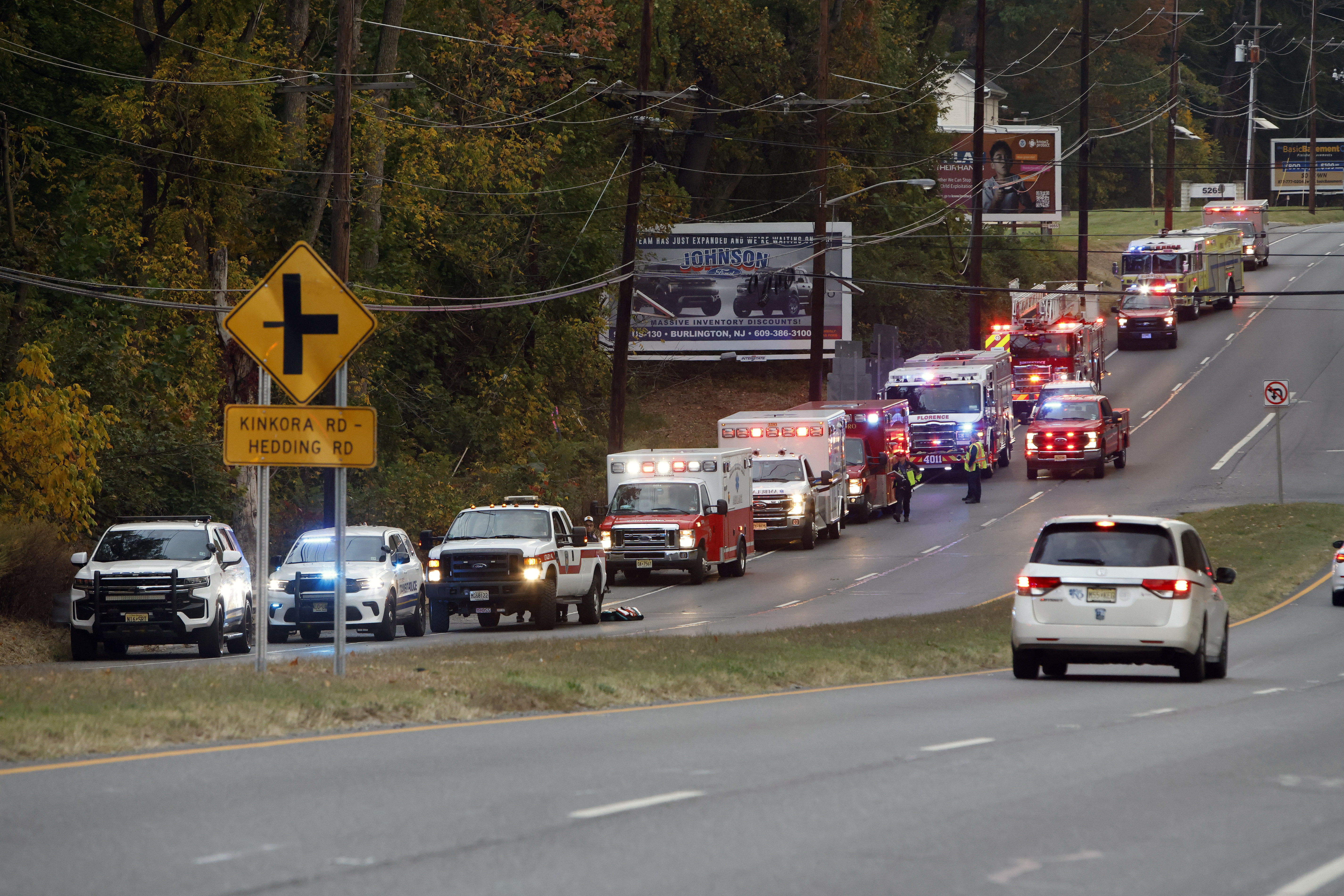 Fire and rescue personnel are on the scene of a train accident in Mansfield Twp., Burlington County, Monday, Oct. 14, 2024. (Alejandro A. Alvarez/The Philadelphia Inquirer via AP)