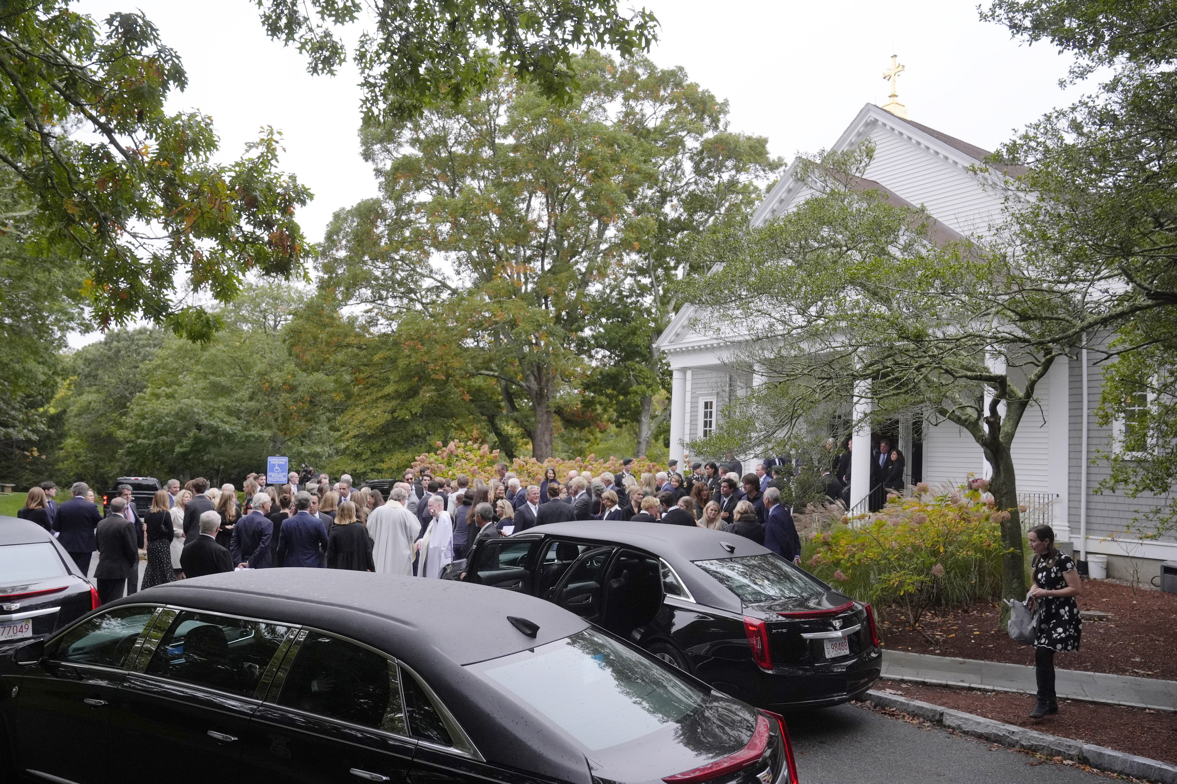 Mourners depart Our Lady of Victory church following funeral services for Ethel Kennedy, wife of the late Sen. Robert F. Kennedy, Monday, Oct. 14, 2024, in Centerville, Mass. (AP Photo/Steven Senne)