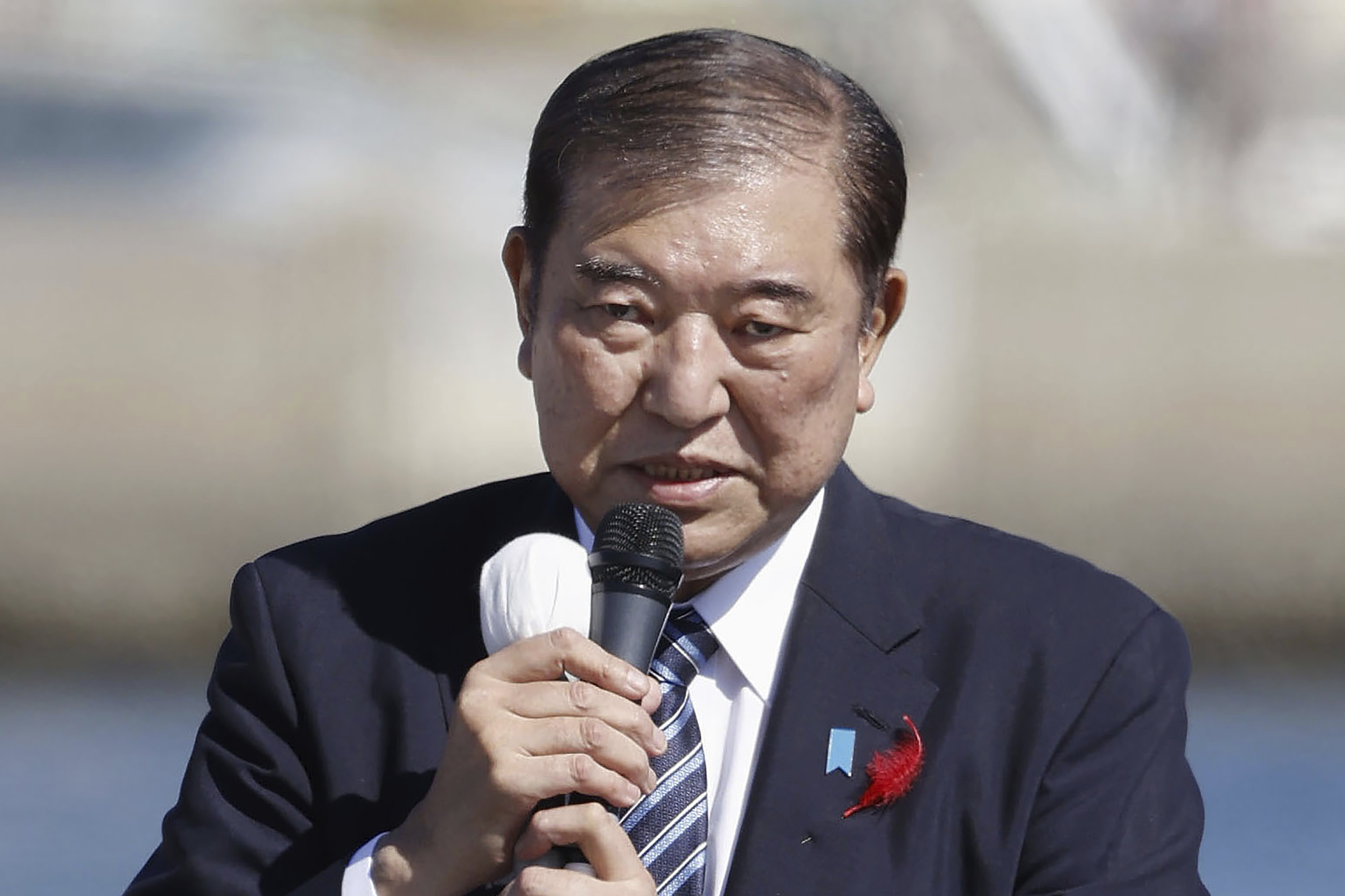 Japan's Prime Minister and head of the governing Liberal Democratic Party Shigeru Ishiba delivers a speech in Iwaki, Fukushima prefecture, Japan as official campaigning for a parliamentary election later this month officially kicked off Tuesday, Oct. 15, 2024. (Kyodo News via AP)