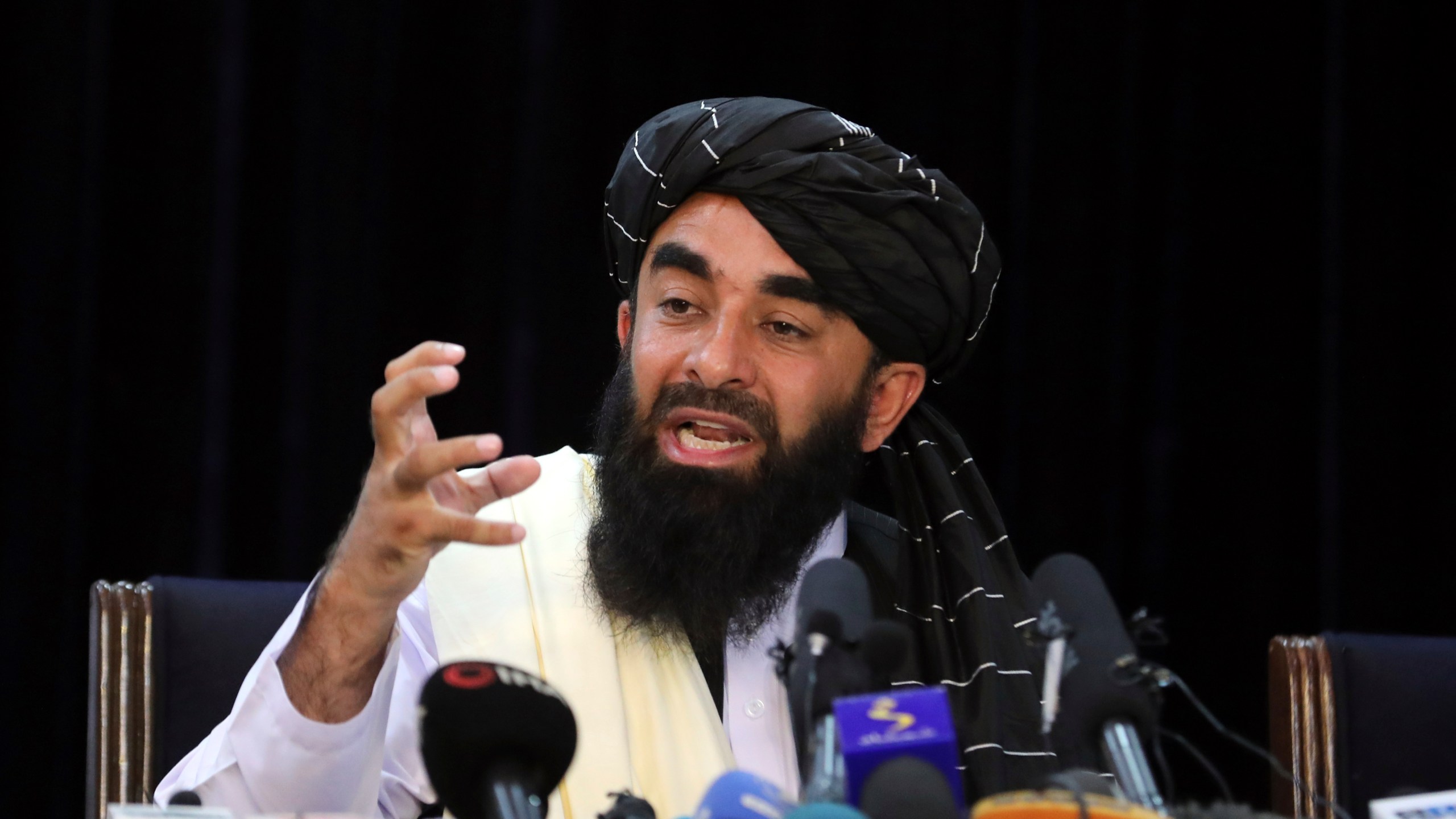 FILE - Taliban spokesman Zabihullah Mujahid speaks at his first news conference, in Kabul, Afghanistan, Tuesday, Aug. 17, 2021. (AP Photo/Rahmat Gul, File)