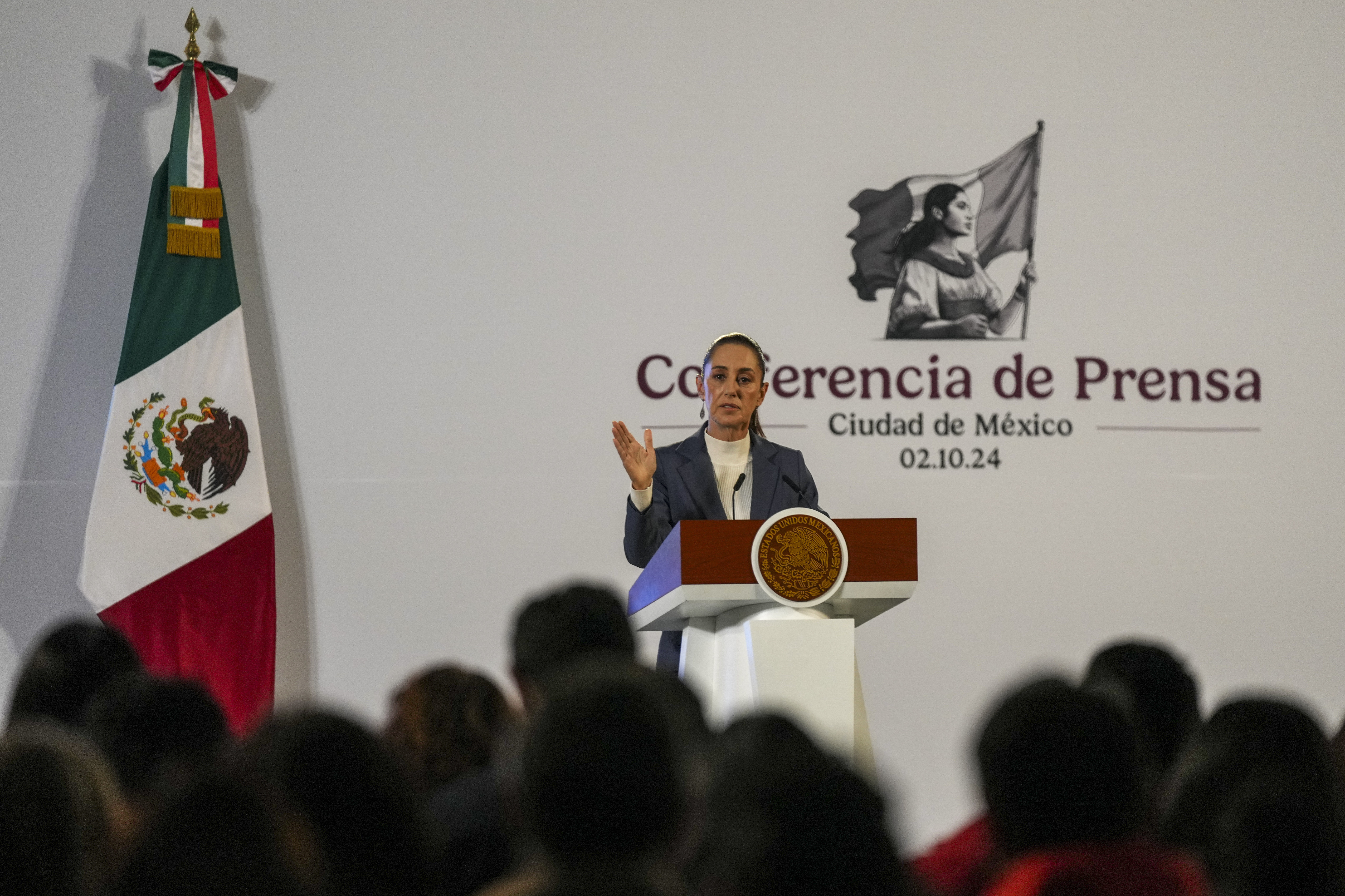 FILE - Mexican President Claudia Sheinbaum gives a media briefing from the National Palace in Mexico City, Oct. 2, 2024, the morning after her inauguration. (AP Photo/Fernando Llano, File)