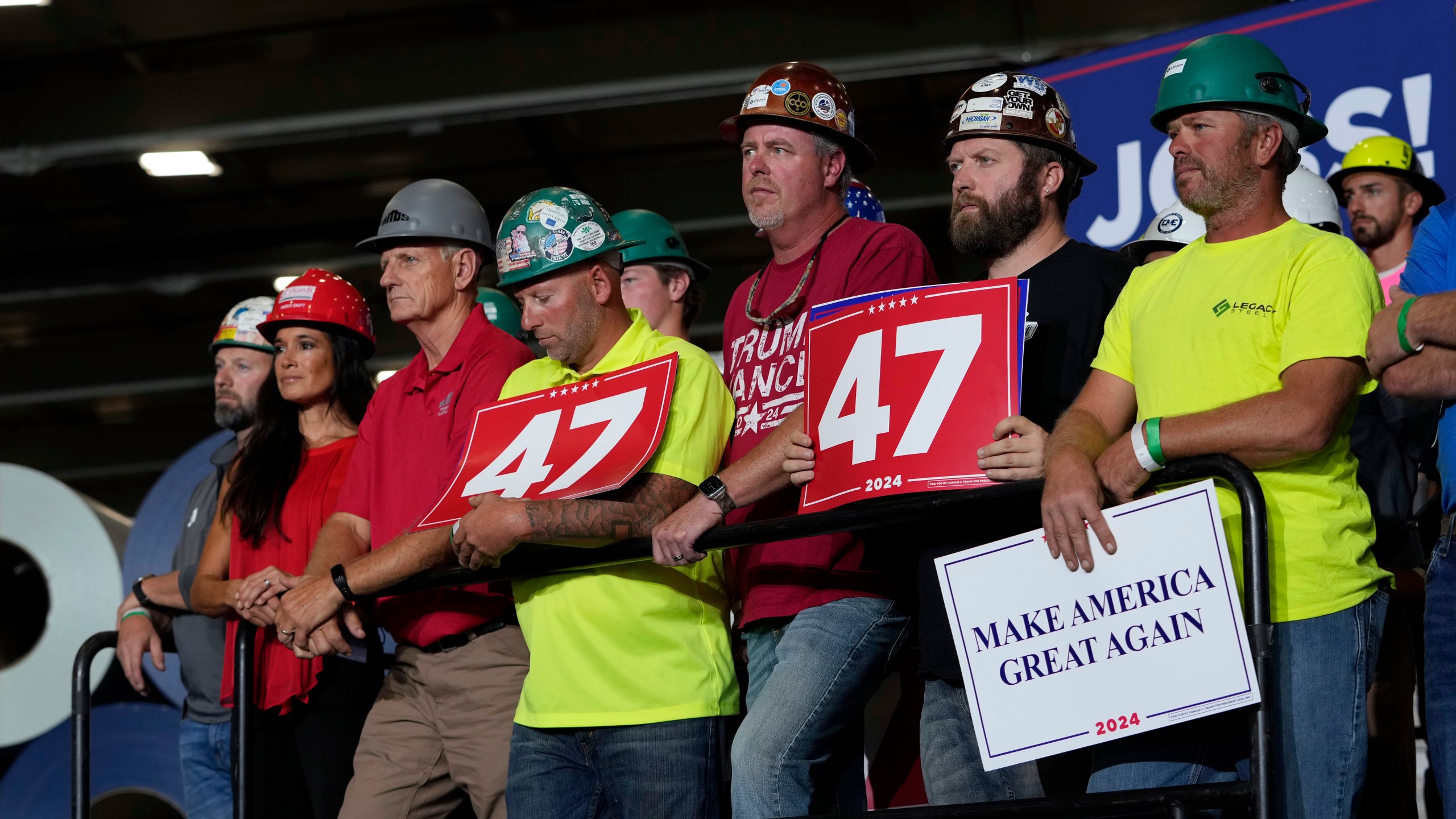 FILE - People arrive before Republican presidential nominee former President Donald Trump speaks at a campaign event, Sept. 27, 2024 in Walker, Mich. (AP Photo/Carlos Osorio, File)