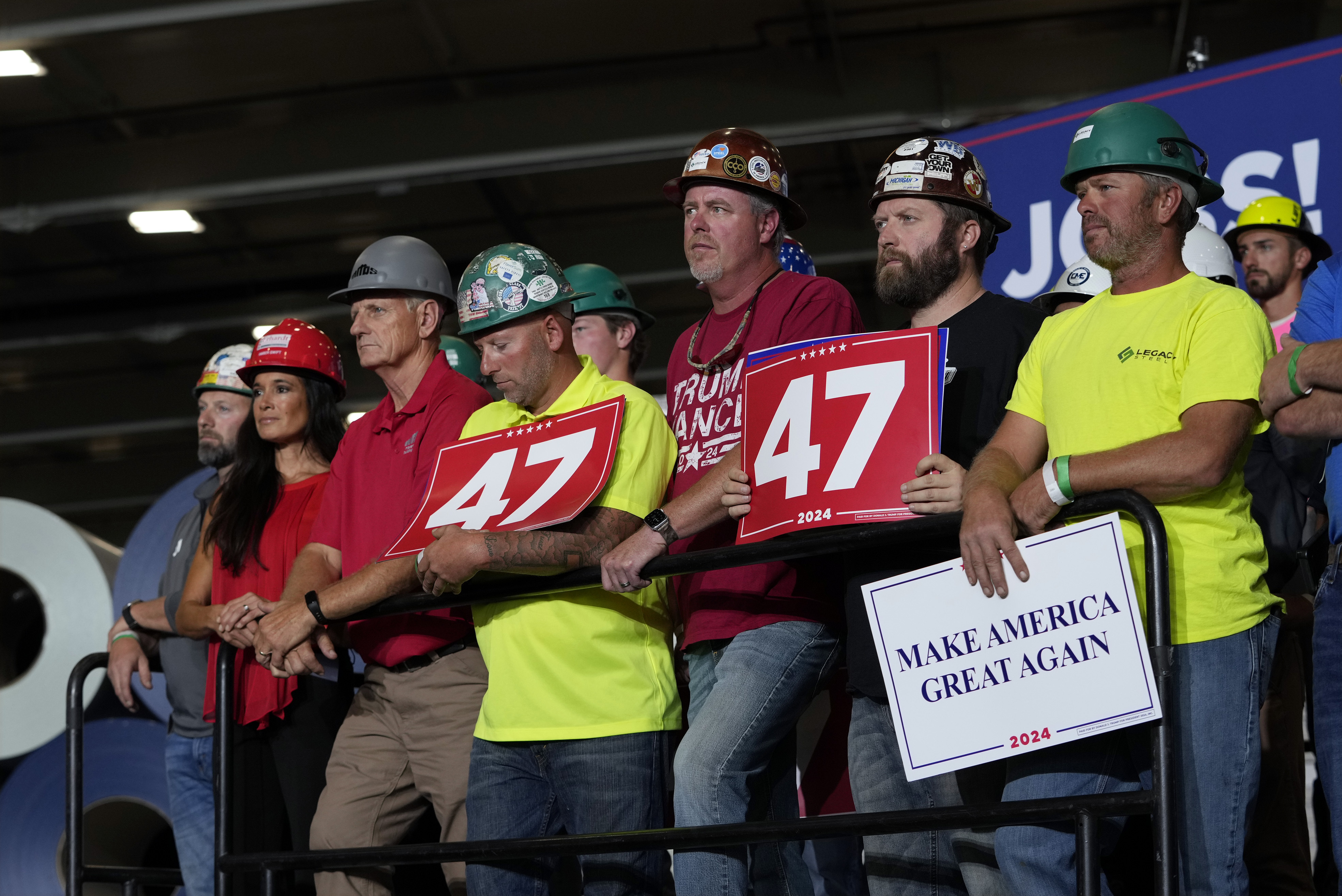 FILE - People arrive before Republican presidential nominee former President Donald Trump speaks at a campaign event, Sept. 27, 2024 in Walker, Mich. (AP Photo/Carlos Osorio, File)