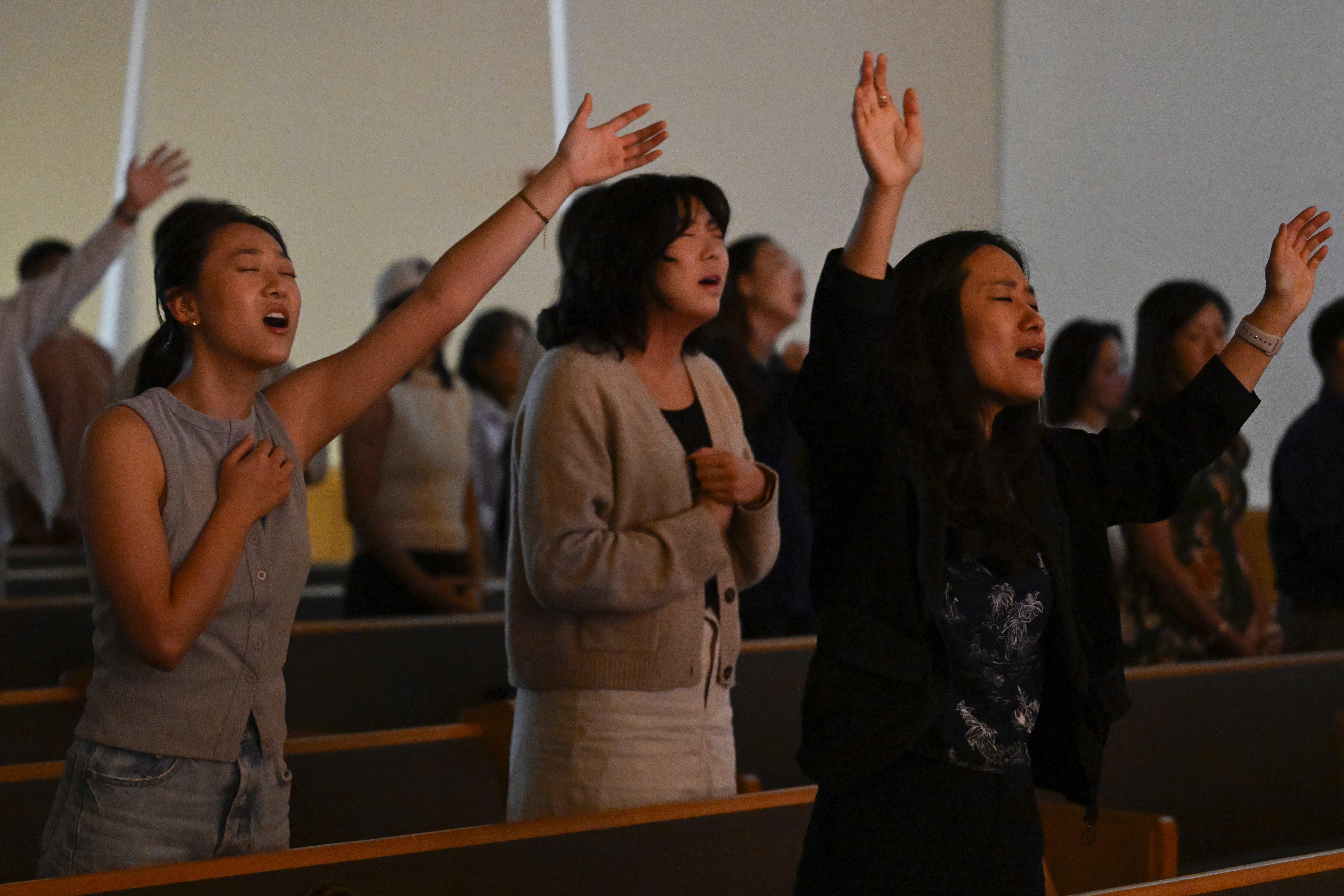 Parishioners pray during a service at the Christ Central Presbyterian Church, Sunday, Oct. 13, 2024 in Centreville. (AP Photo/John McDonnell)