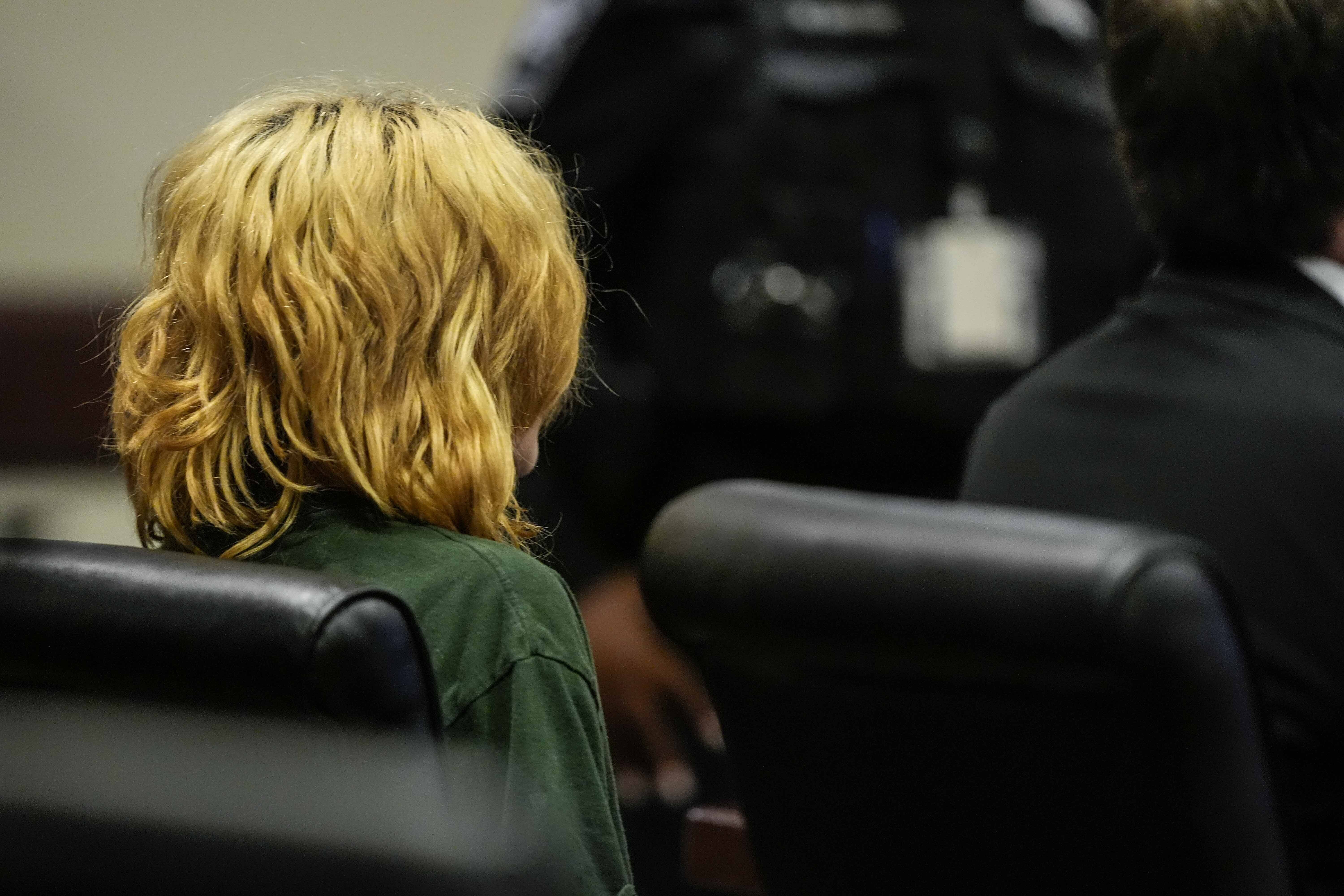 FILE - Colt Gray, charged as an adult with four counts of murder, sits in the Barrow County courthouse during his first appearance for the shooting at Apalachee High School, Sept. 6, 2024, in Winder, Ga. (AP Photo/Brynn Anderson, Pool, File)