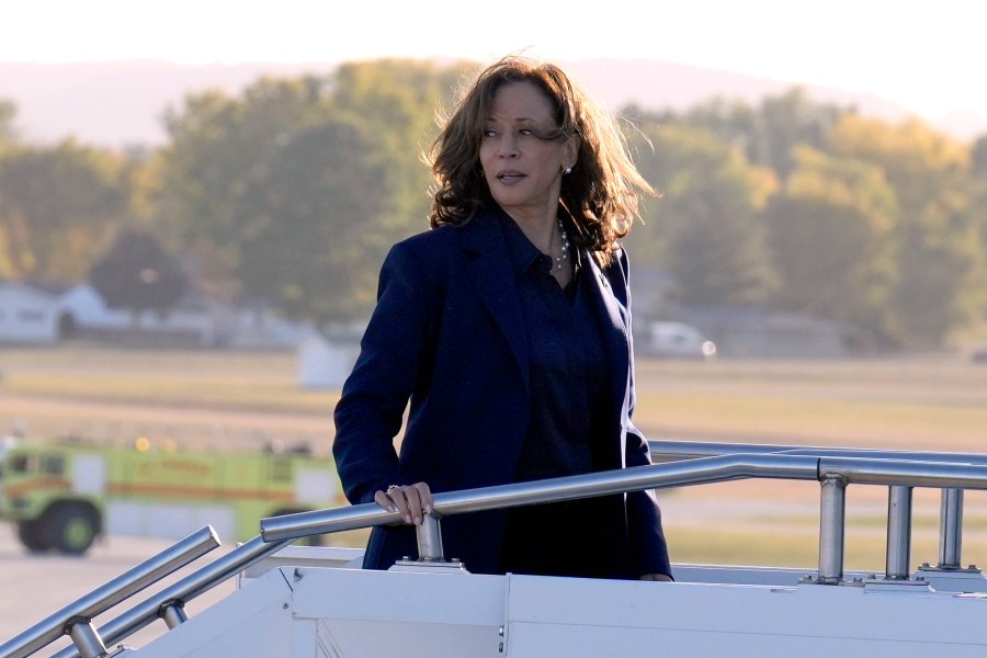 Democratic presidential nominee Vice President Kamala Harris boards Air Force Two upon departing La Crosse Regional Airport in La Crosse, Wis., Thursday, Oct. 17, 2024, en route to Green Bay, Wis. (AP Photo/Jacquelyn Martin, Pool)