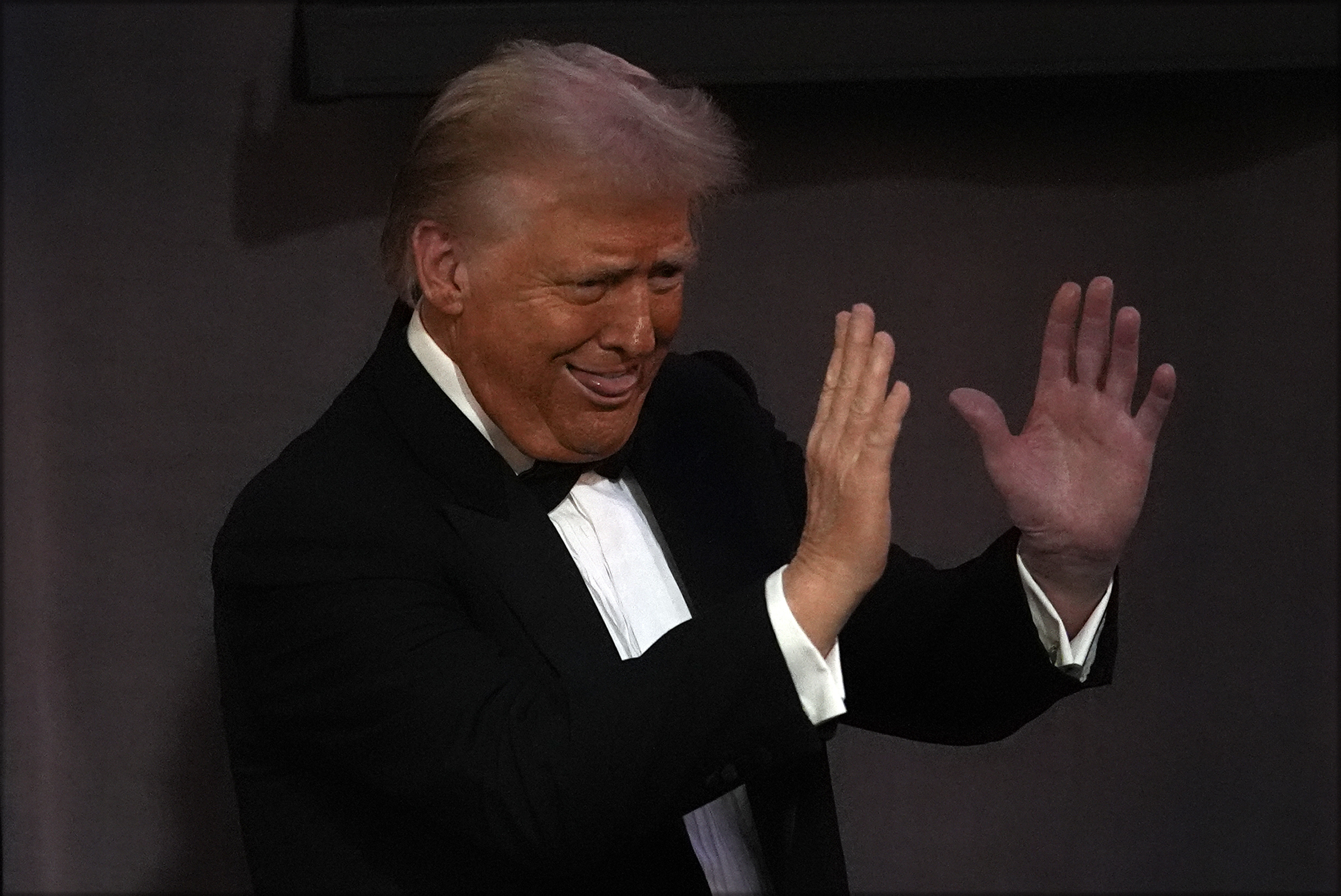 Republican presidential nominee former President Donald Trump gestures as he departs the 79th annual Alfred E. Smith Memorial Foundation Dinner, Thursday, Oct. 17, 2024, in New York. (AP Photo/Julia Demaree Nikhinson)