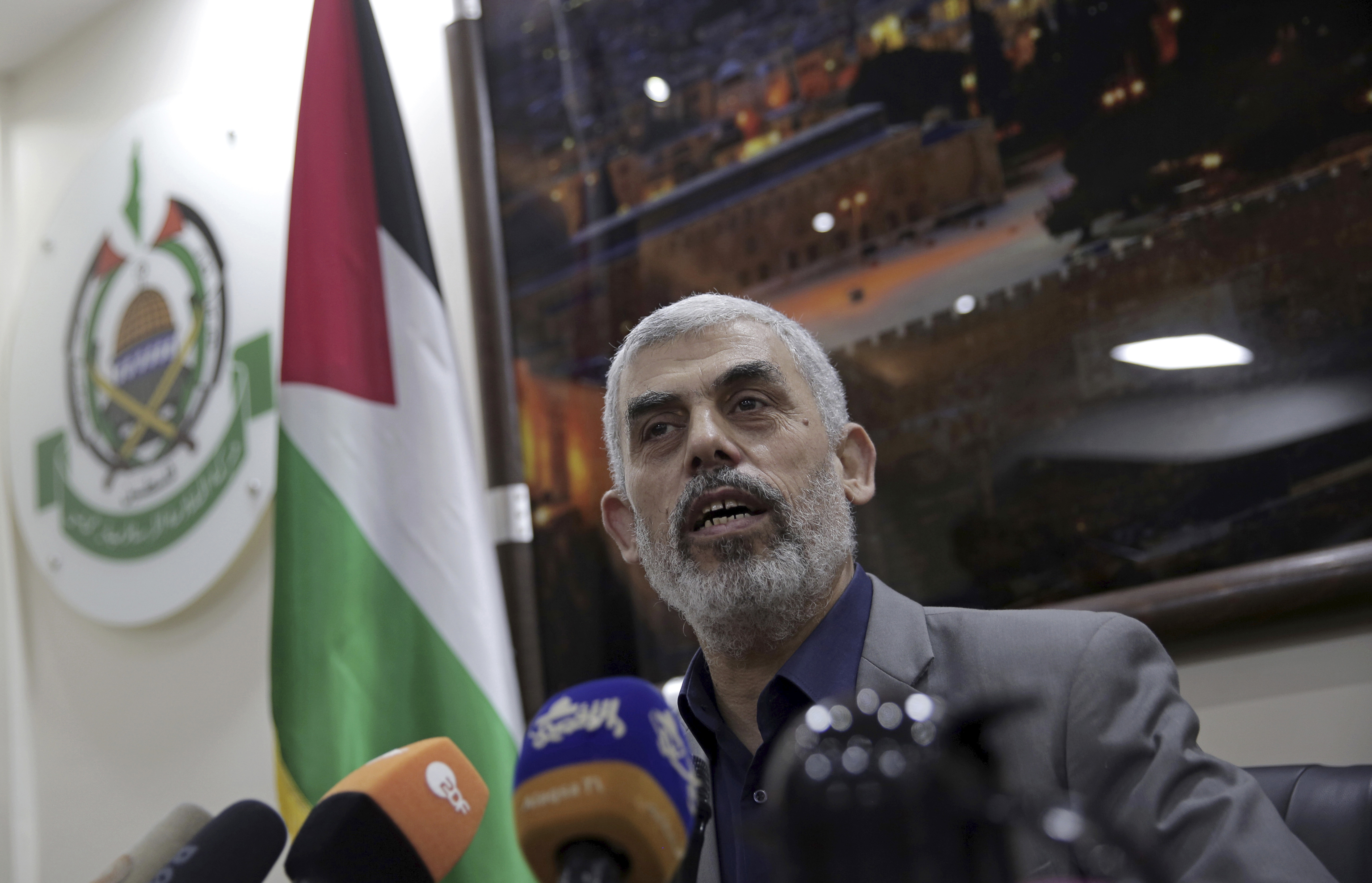 FILE - Yahya Sinwar speaks to foreign correspondents in his office in Gaza City on May 10, 2018. (AP Photo/Khalil Hamra, File)