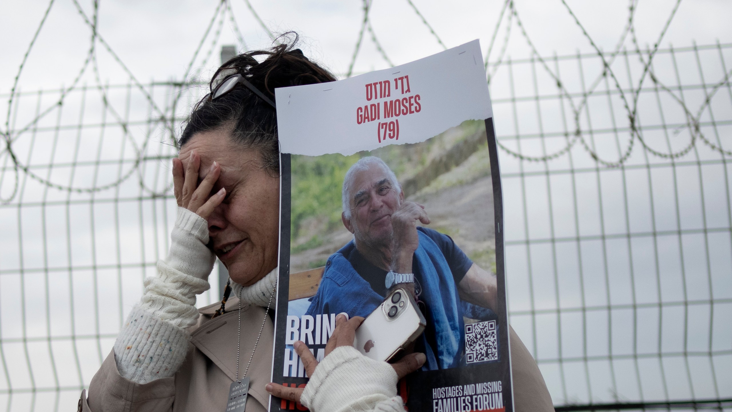 FILE - Efrat Machikawa, whose uncle, Gadi Moses is in Hamas captivity in the Gaza Strip since his capture from Kibbutz Nir Oz on Oct. 7, reacts at the Gaza border in Kibbutz Nirim, southern Israel, on Jan. 11, 2024. (AP Photo/Maya Alleruzzo)