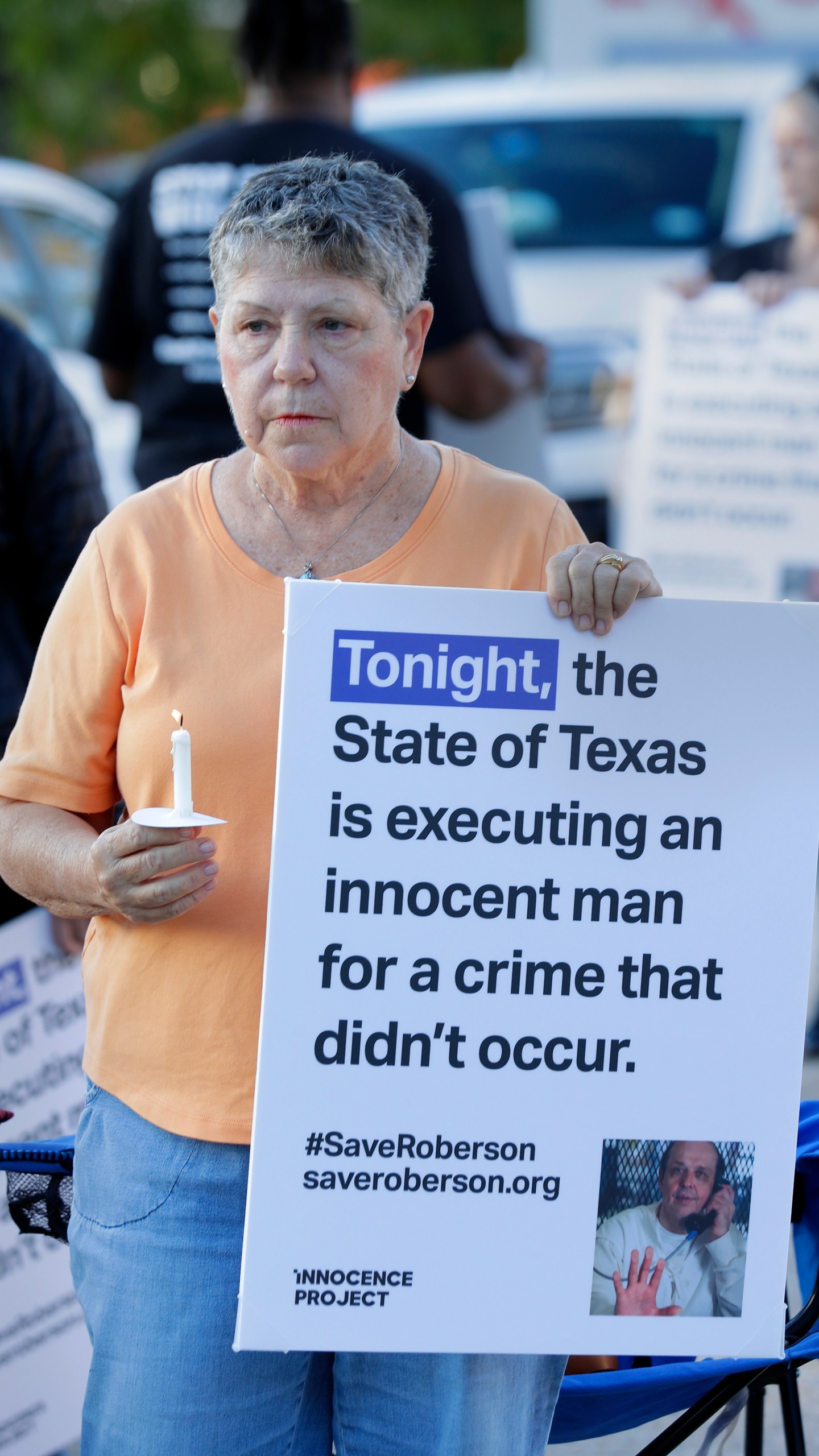 Ann Dorn, a local Catholic parishioner opposed to the death penalty, protest outside the prison where Robert Roberson is scheduled for execution at the Huntsville Unit of the Texas State Penitentiary, Thursday, Oct. 17, 2024, in Huntsville, Texas. (AP Photo/Michael Wyke)