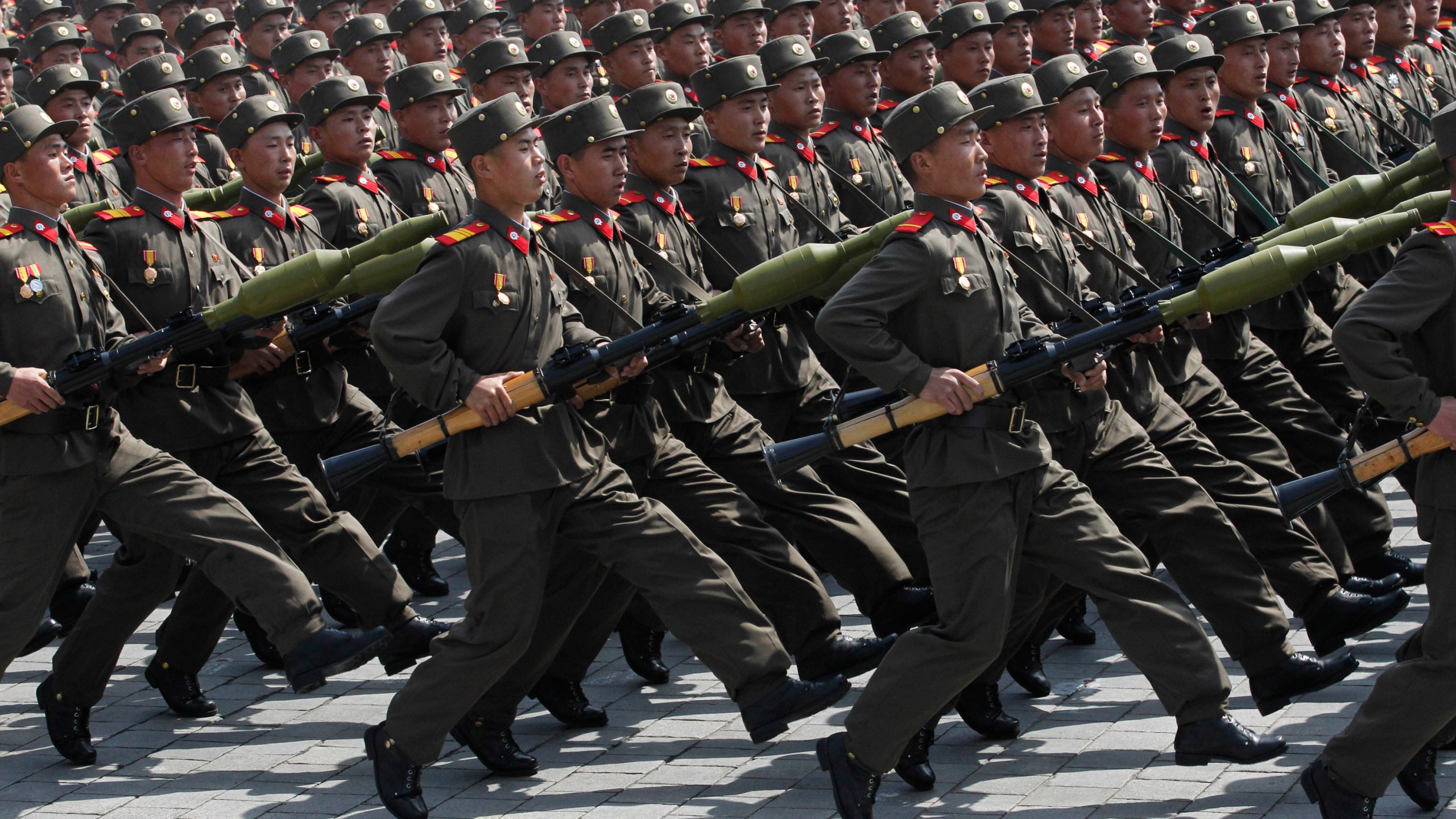 FILE - North Korean soldiers march during a mass military parade in Pyongyang's Kim Il Sung Square to celebrate 100 years since the birth of North Korean founder, Kim Il Sung on April 15, 2012. (AP Photo/Ng Han Guan, File)