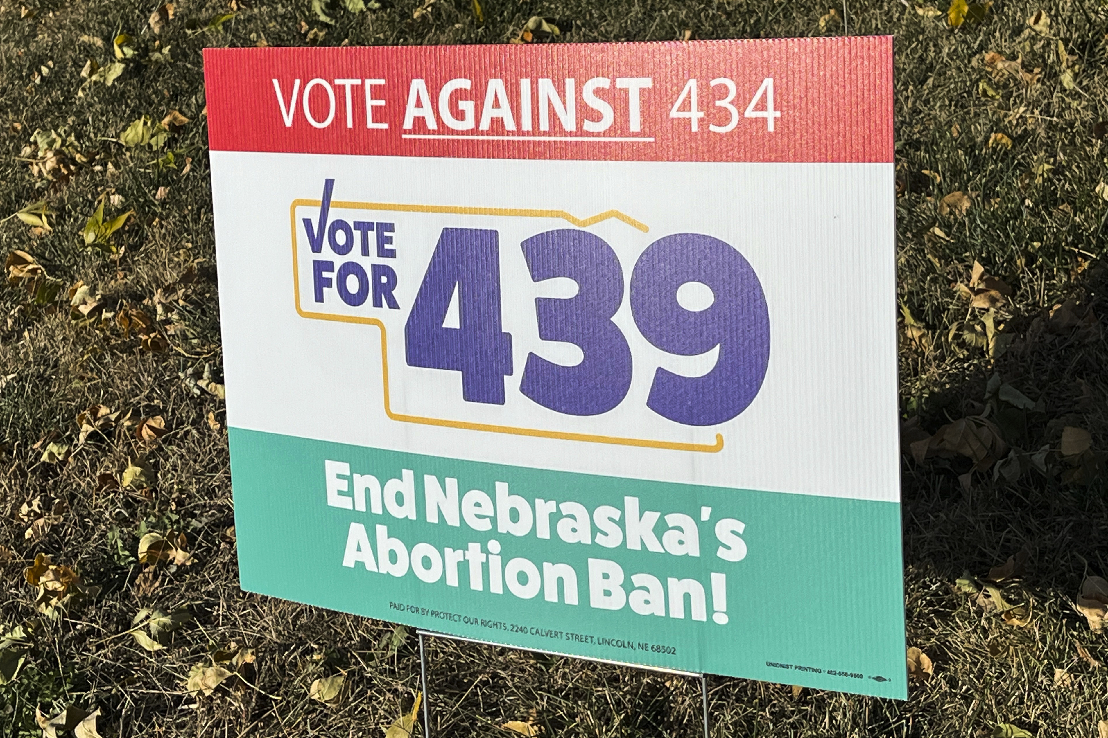 A sign supporting a ballot measure to expand abortion rights is seen in a yard, Friday, Oct. 18, 2024, in Omaha, Neb. (AP Photo/Margery Beck)