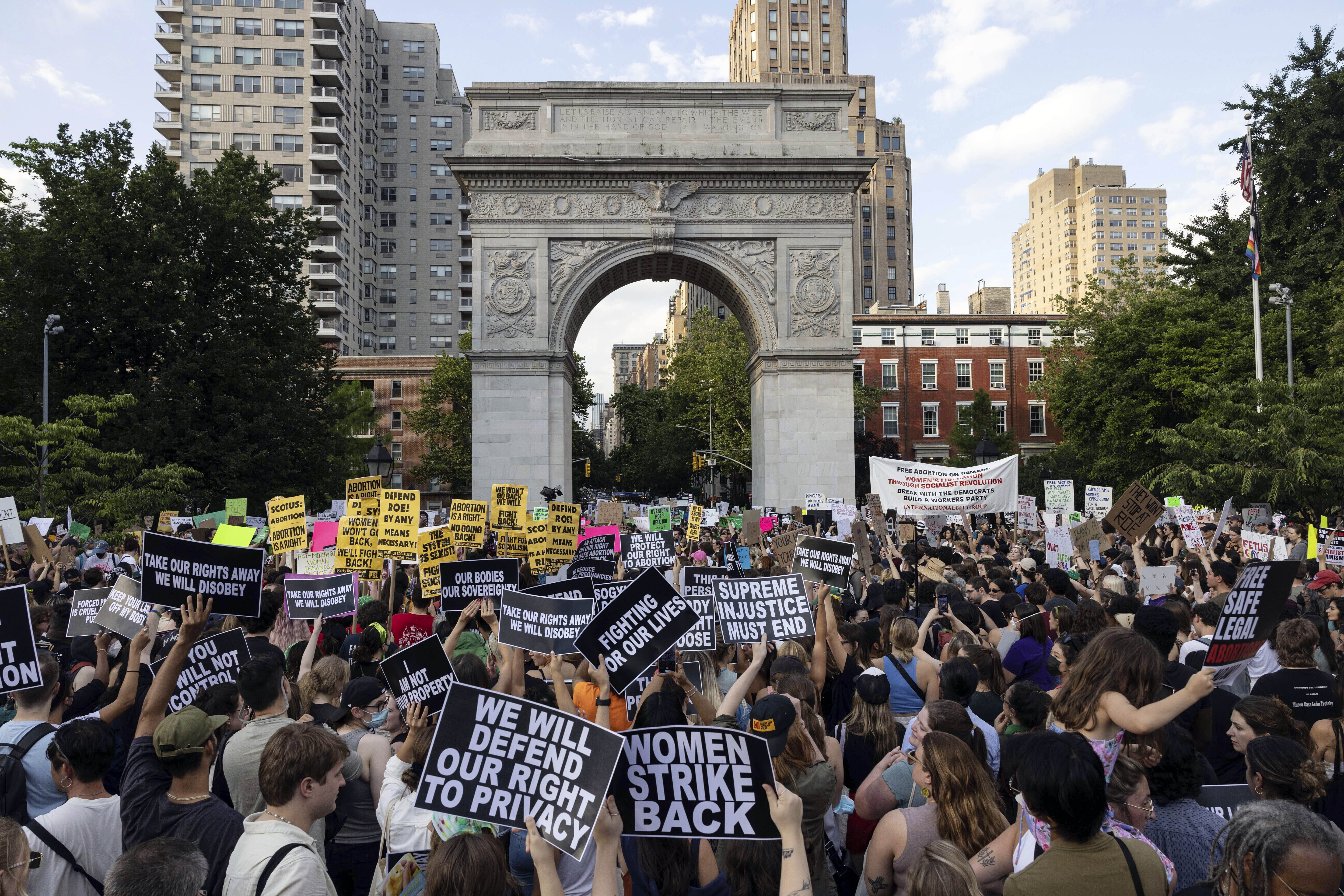 FILE - Abortion rights activists gather for a protest following the U.S. Supreme Court's decision to overturn Roe v. Wade, at Washington Square Park, June 24, 2022, in New York. (AP Photo/Yuki Iwamura, File)