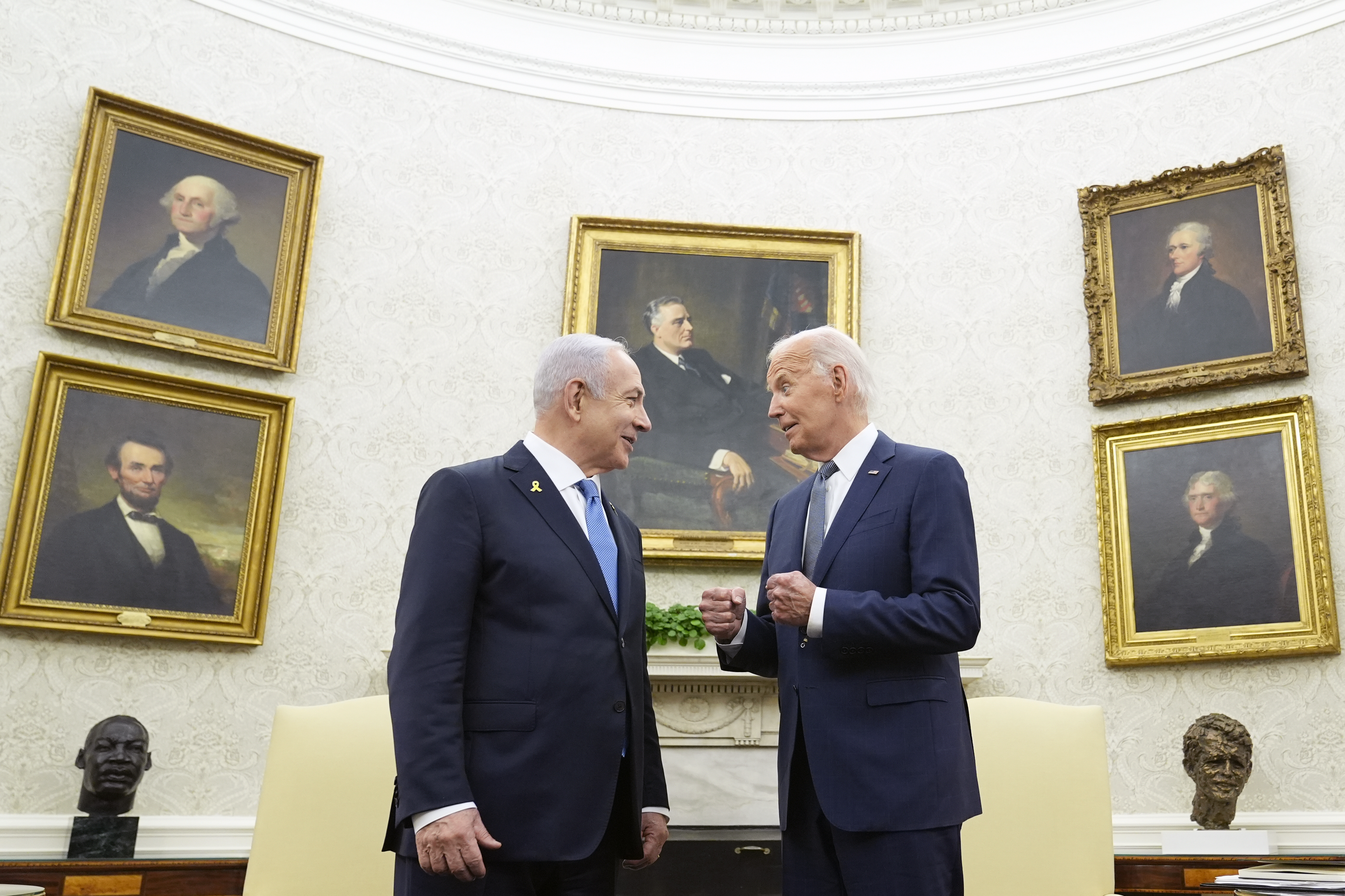 FILE - President Joe Biden, right, talks with Israeli Prime Minister Benjamin Netanyahu, left, in the Oval Office of the White House in Washington, July 25, 2024. U.S. officials say the Biden administration believes it has won assurances from Israel that it will not strike Iranian nuclear or oil sites as it looks to strike back following Iran’s missile barrage earlier this month. The officials, who spoke on condition of anonymity to discuss private diplomatic discussions, cautioned that the pledge is not iron-clad and that circumstances could change. (AP Photo/Susan Walsh, File)