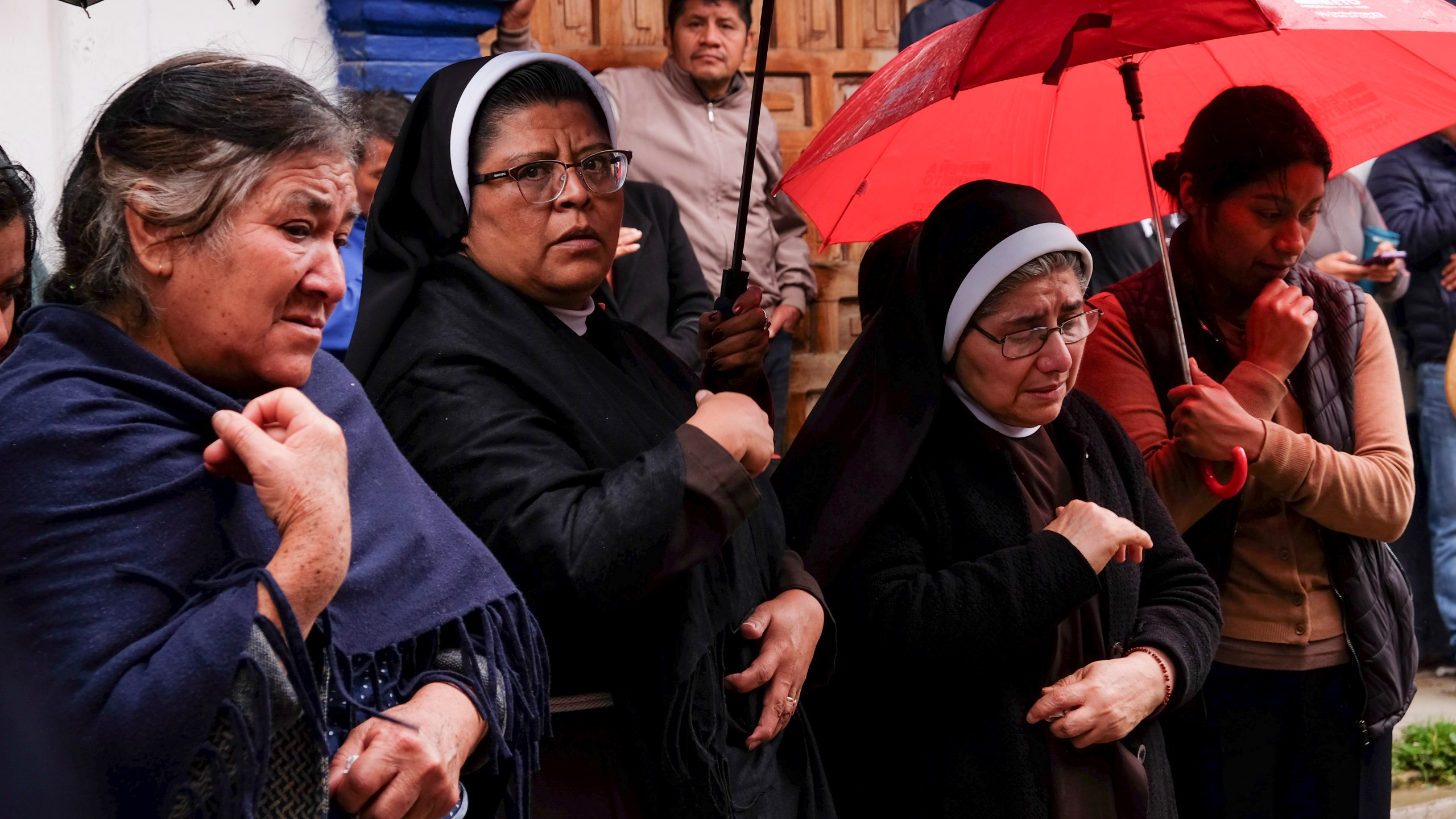 People gather around an altar where Catholic priest Marcelo Perez died in an armed attack after attending mass at a church in San Cristobal de las Casas, Chiapas state, Mexico, Sunday, Oct. 20, 2024. (AP Photo/Isabel Mateos)