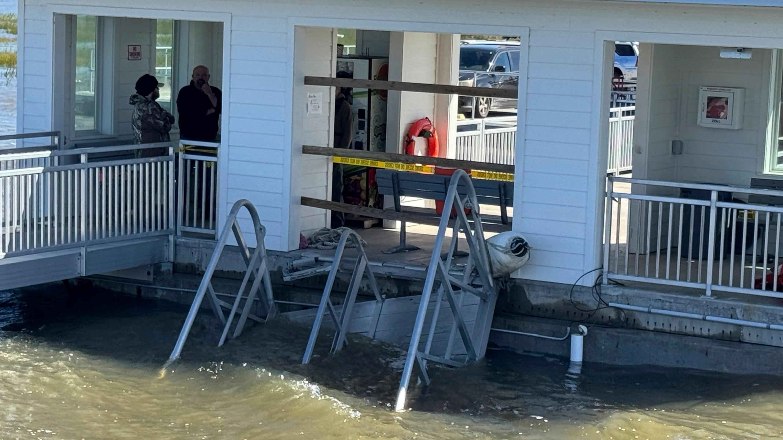 A portion of the gangway which collapsed Saturday afternoon remains visible on Sapelo Island in McIntosh county, Ga., Sunday, Oct. 20, 2024. (AP Photo/Lewis Levine)