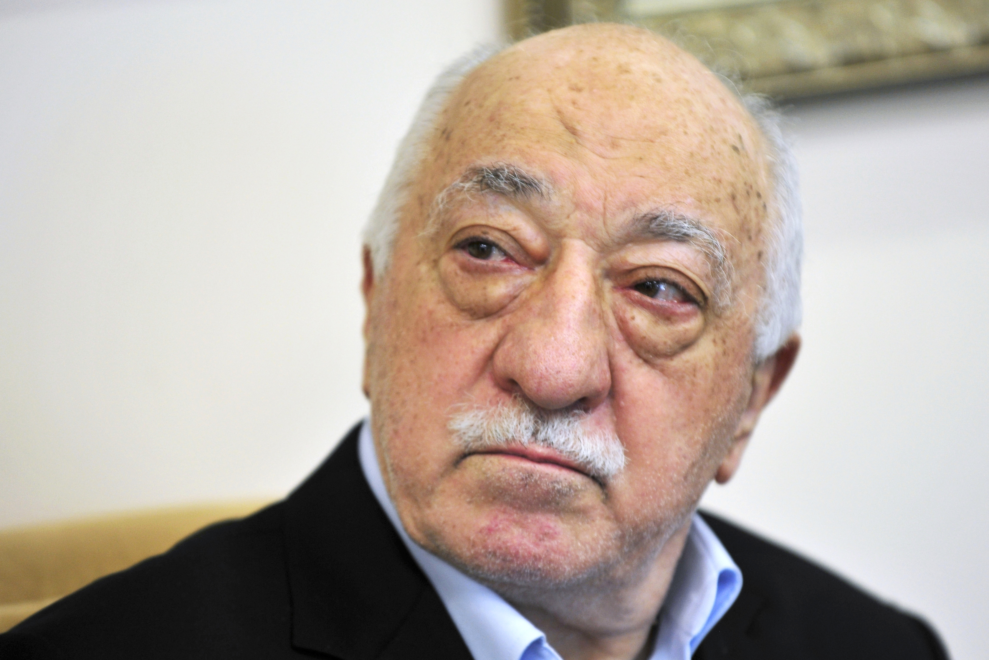 FILE - Turkish Islamic cleric Fethullah Gulen speaks to members of the media at his compound in Saylorsburg, Pa. in July 2016. (AP Photo/Chris Post, File)