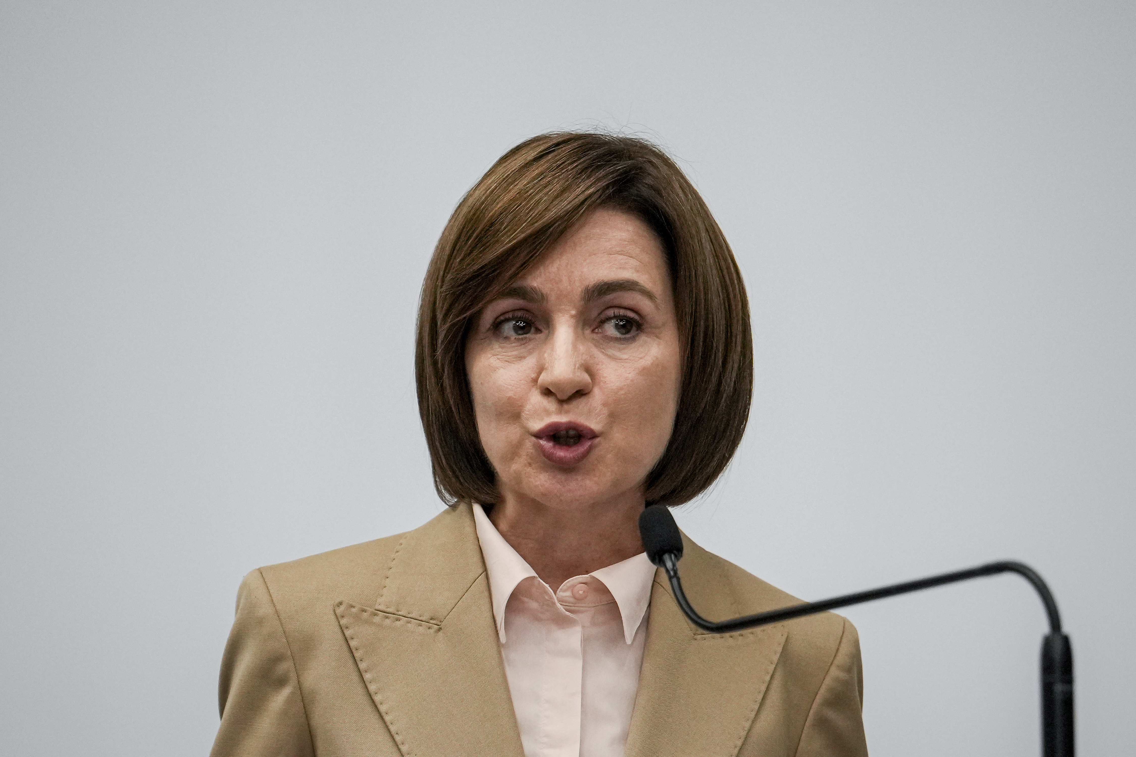 Moldova's President Maia Sandu speaks to the media during a press briefing after the polls closed for the presidential election and the referendum on whether to enshrine in the Constitution the country's path to European Union membership, in Chisinau, Moldova, early Monday, Oct. 21, 2024. (AP Photo/Vadim Ghirda)