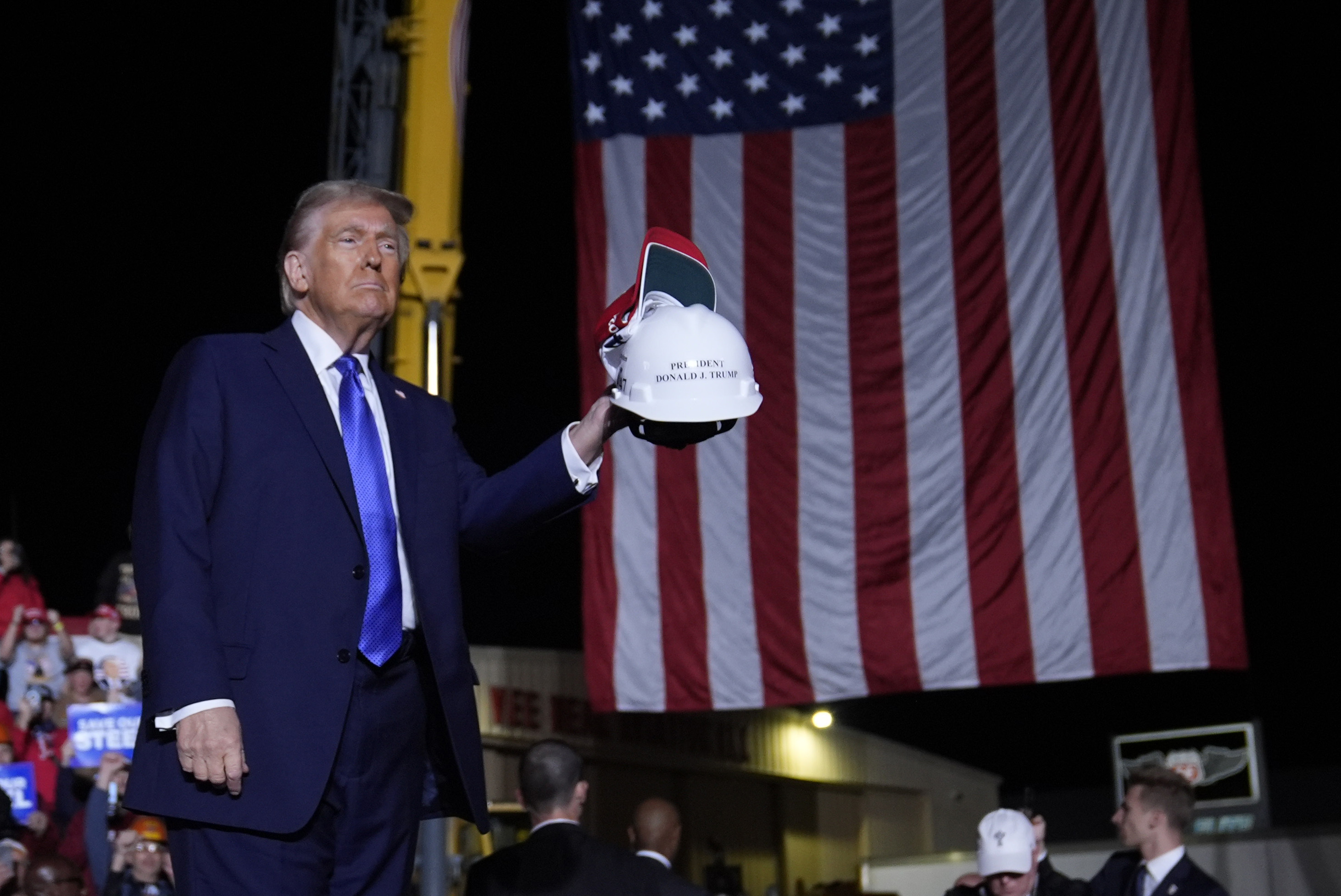 Republican presidential nominee former President Donald Trump gestures at a campaign rally at Arnold Palmer Regional Airport, Saturday, Oct. 19, 2024, in Latrobe, Pa. (AP Photo/Evan Vucci)