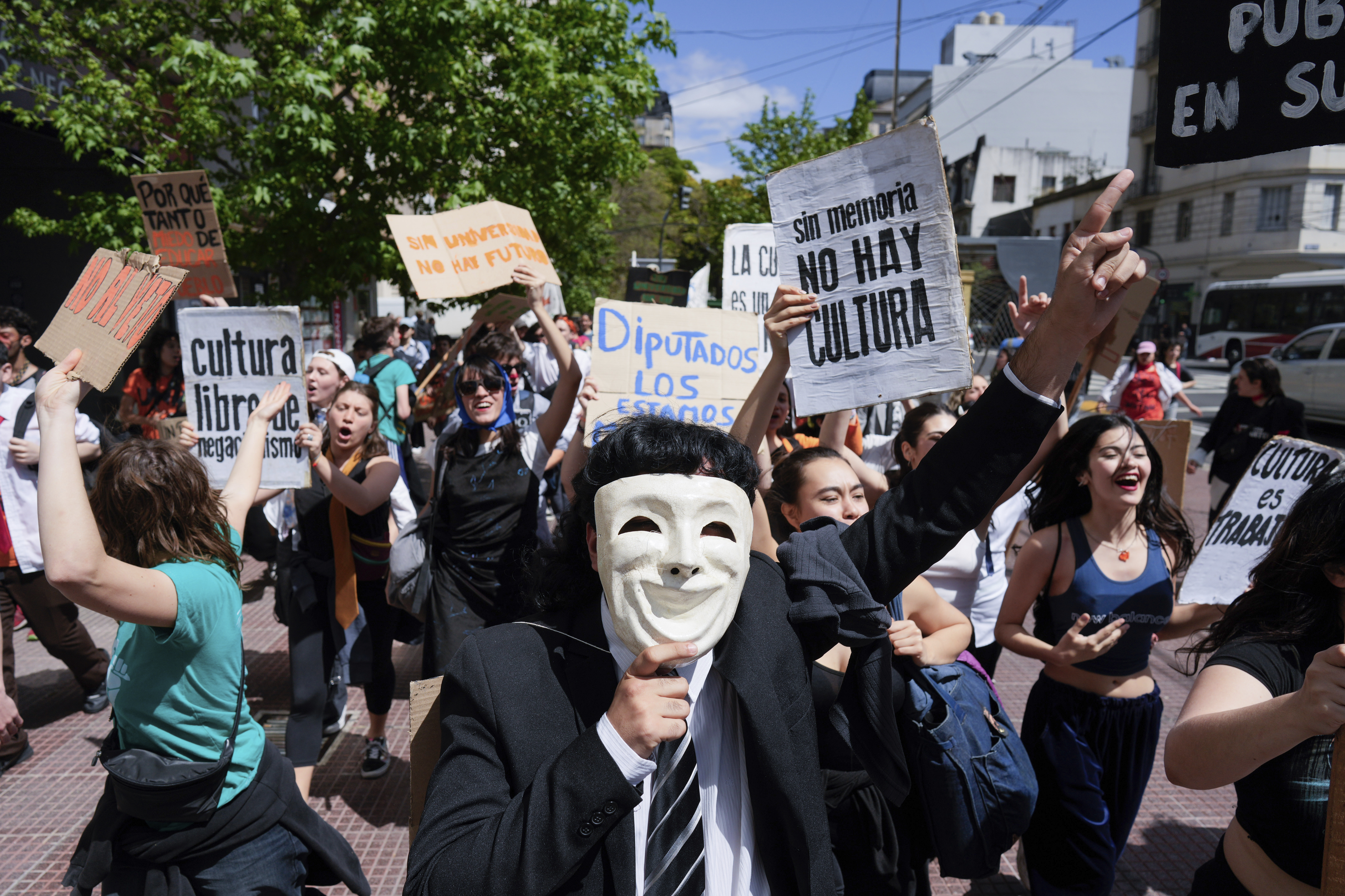 Students march to Congress to protest President Javier Milei's veto of a law to increase funding for public universities in Buenos Aires, Argentina, Wednesday, Oct. 9, 2024. (AP Photo/Rodrigo Abd)