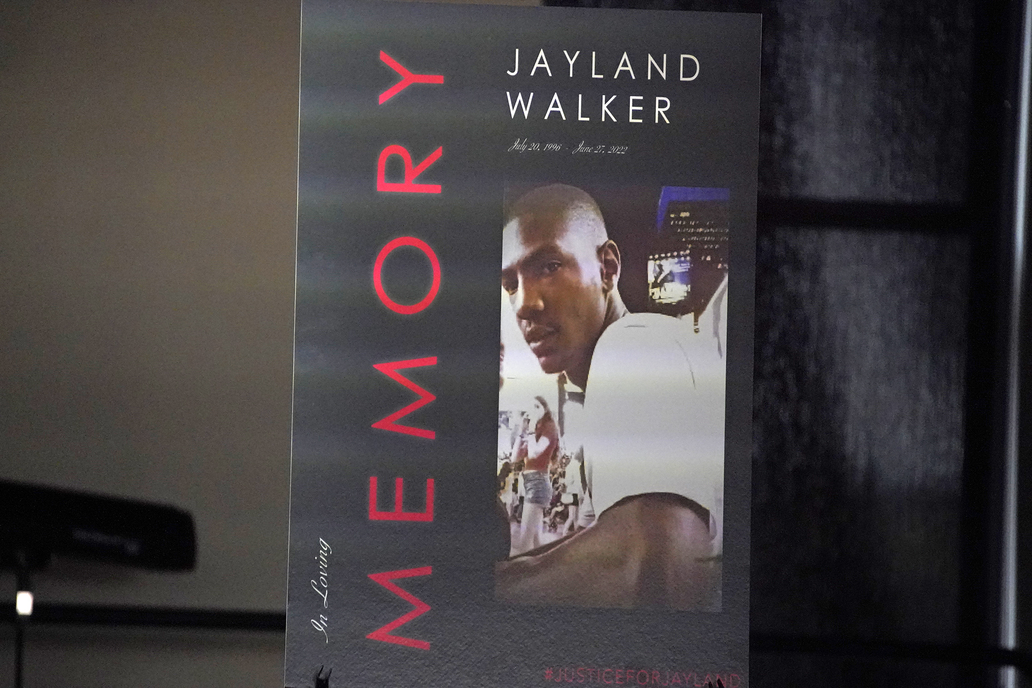 FILE - This is a poster on the stage during a news conference following the funeral service for Jayland Walker at the Akron Civic Center in Akron, Ohio, July 13, 2022. (AP Photo/Gene J. Puskar, file)