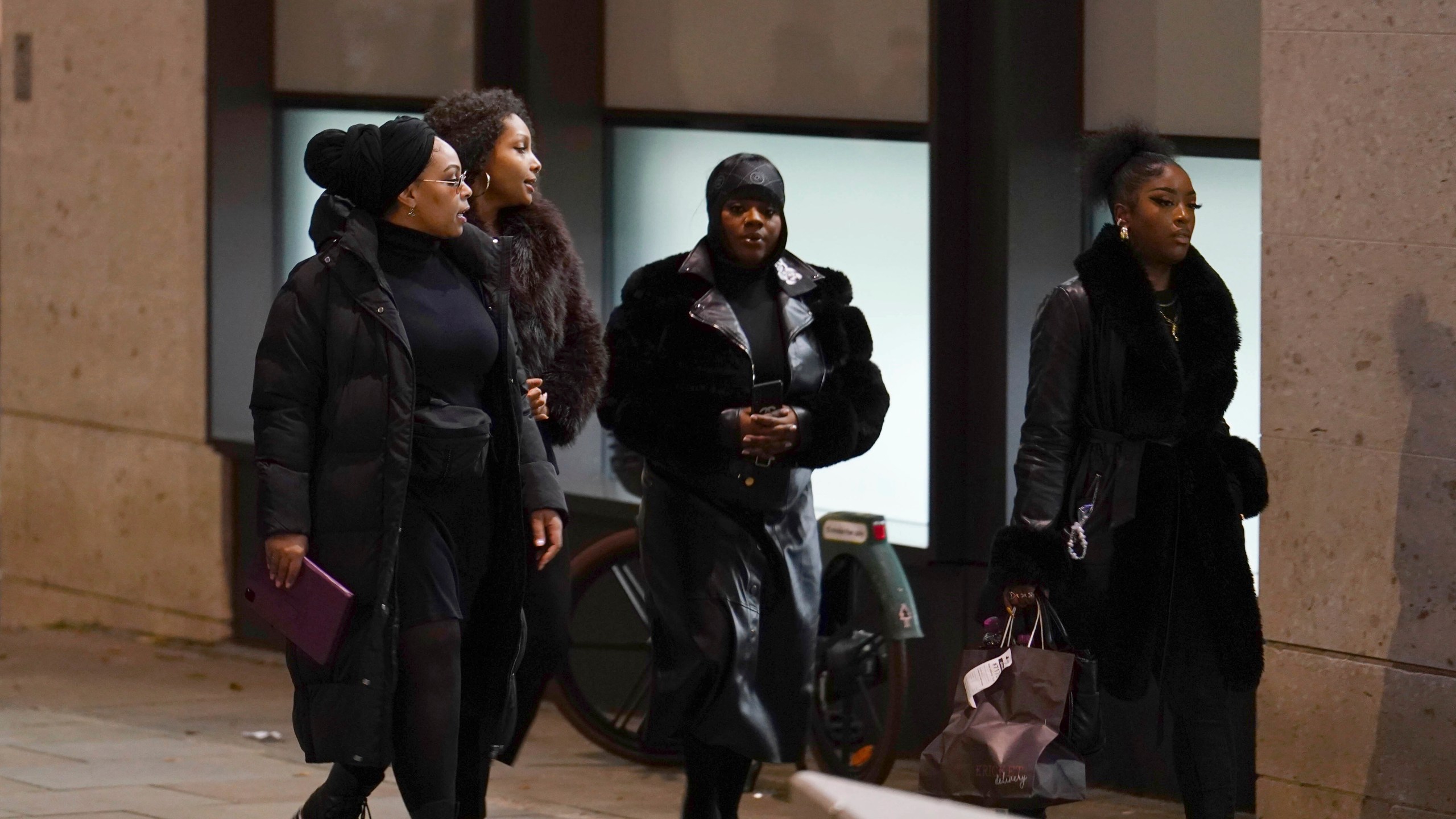 Friends and family members of Chris Kaba leave the Old Bailey in central London, Monday Oct. 21, 2024, after the London police officer who fatally shot Kaba was acquitted of murder. (Jordan Pettitt/PA via AP)