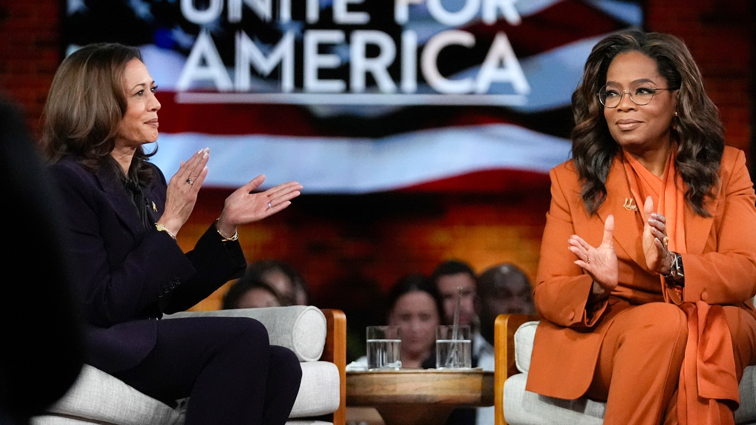 FILE - Democratic presidential nominee Vice President Kamala Harris, left, joins Oprah Winfrey at Oprah's Unite for America Live Streaming event Sept. 19, 2024 in Farmington Hills, Mich. (AP Photo/Paul Sancya, File)