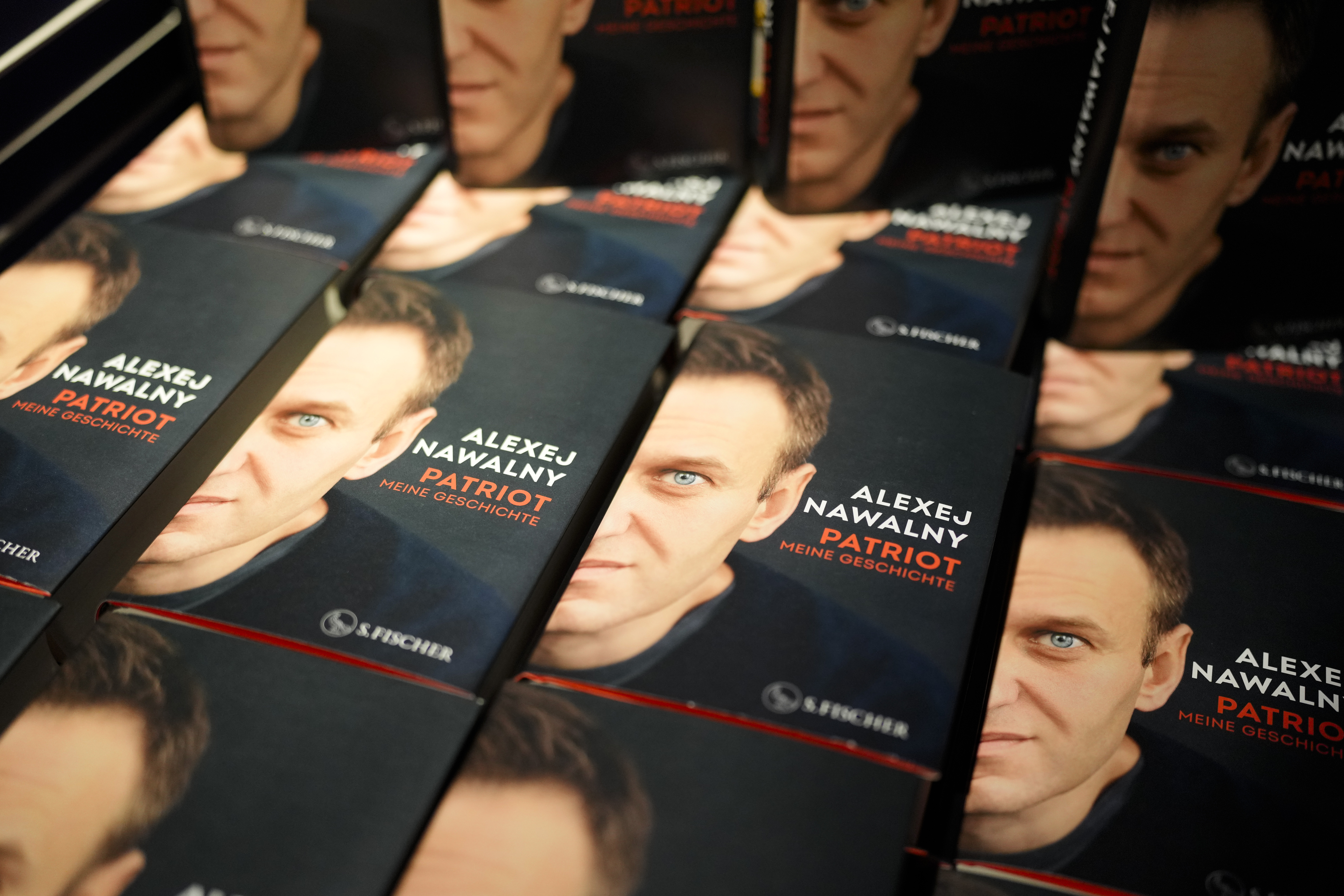 Copies of the late Russian opposition leader Alexei Navalny's memoir entitled 'Patriot' are put display on the first day of sale in a bookshop in Berlin, Germany, Tuesday, Oct. 22, 2024. (AP Photo/Markus Schreiber)