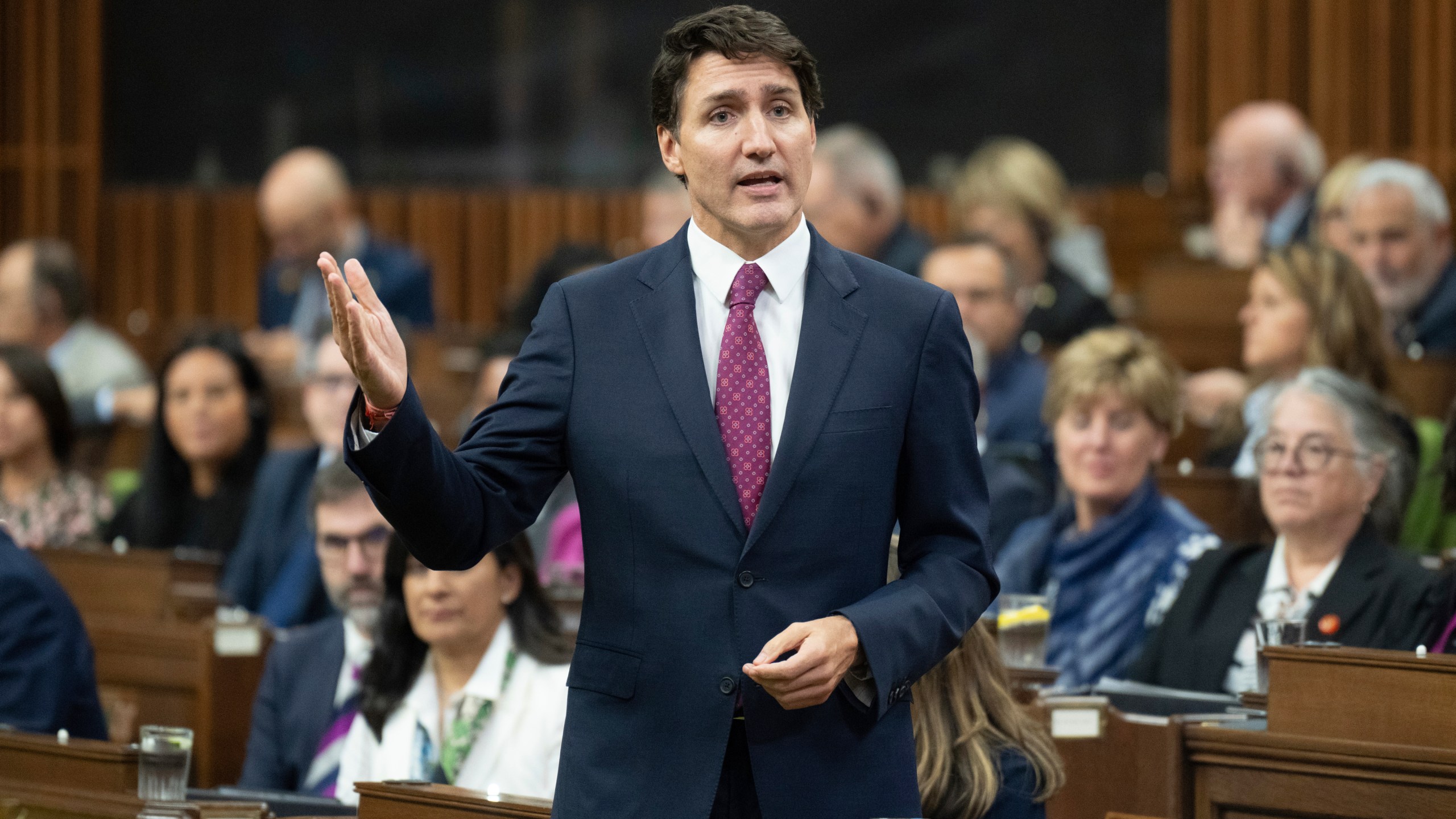 Canada Prime Minister Justin Trudeau rises during Question Period in Ottawa, Tuesday, Oct. 22, 2024. (Adrian Wyld/The Canadian Press via AP)