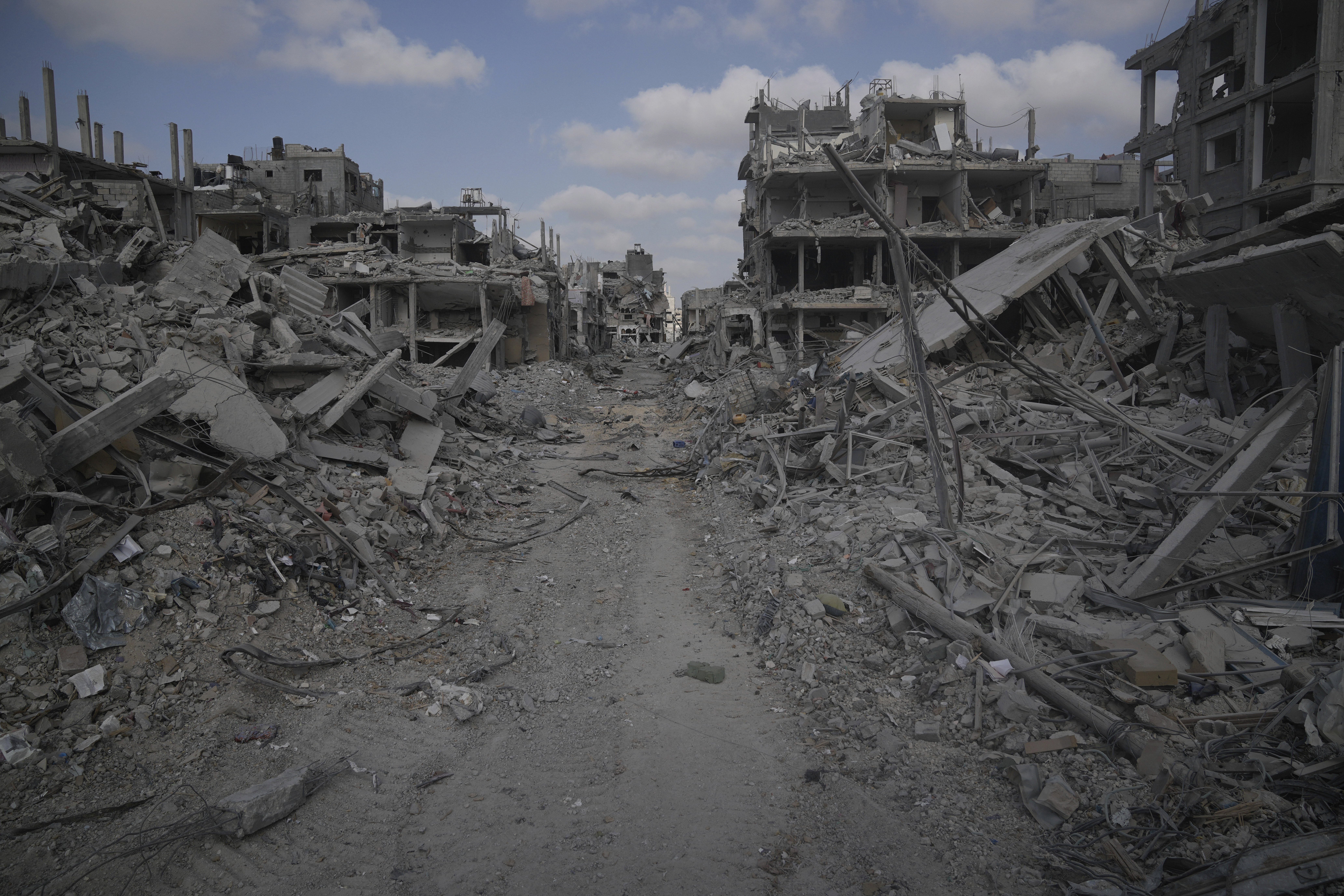 FILE - A view of destroyed buildings is shown following Israeli strikes in the southern Gaza Strip on Sept. 13, 2024. (AP Photo/Leo Correa, File)