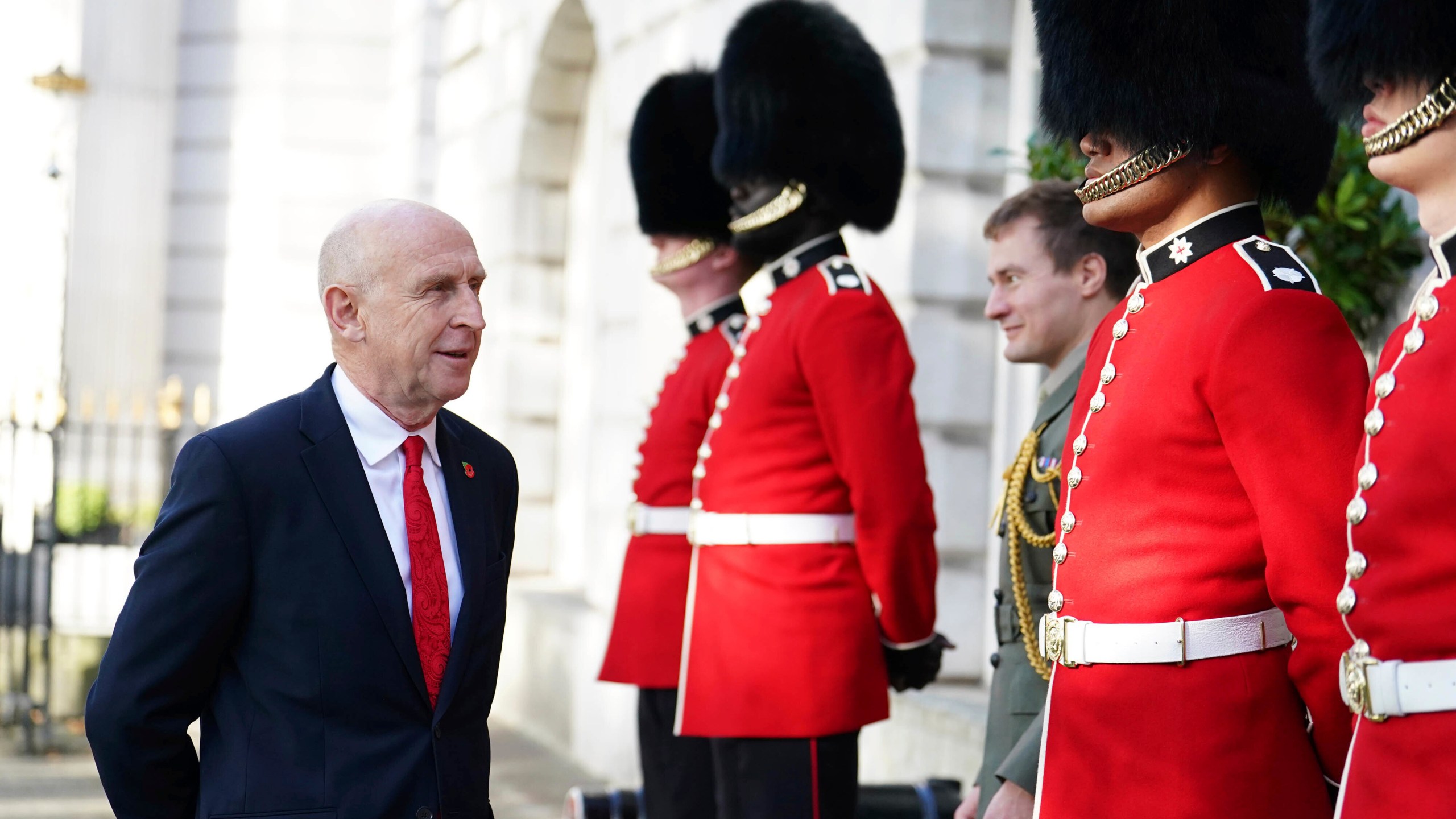 Defence Secretary John Healey speaks to members of the Coldstream Guards before his German counterpart Boris Pistorius arrives to sign a new UK-Germany Defence Agreement at Trinity House in London, Wednesday Oct. 23, 2024. (Jordan Pettitt/PA via AP)