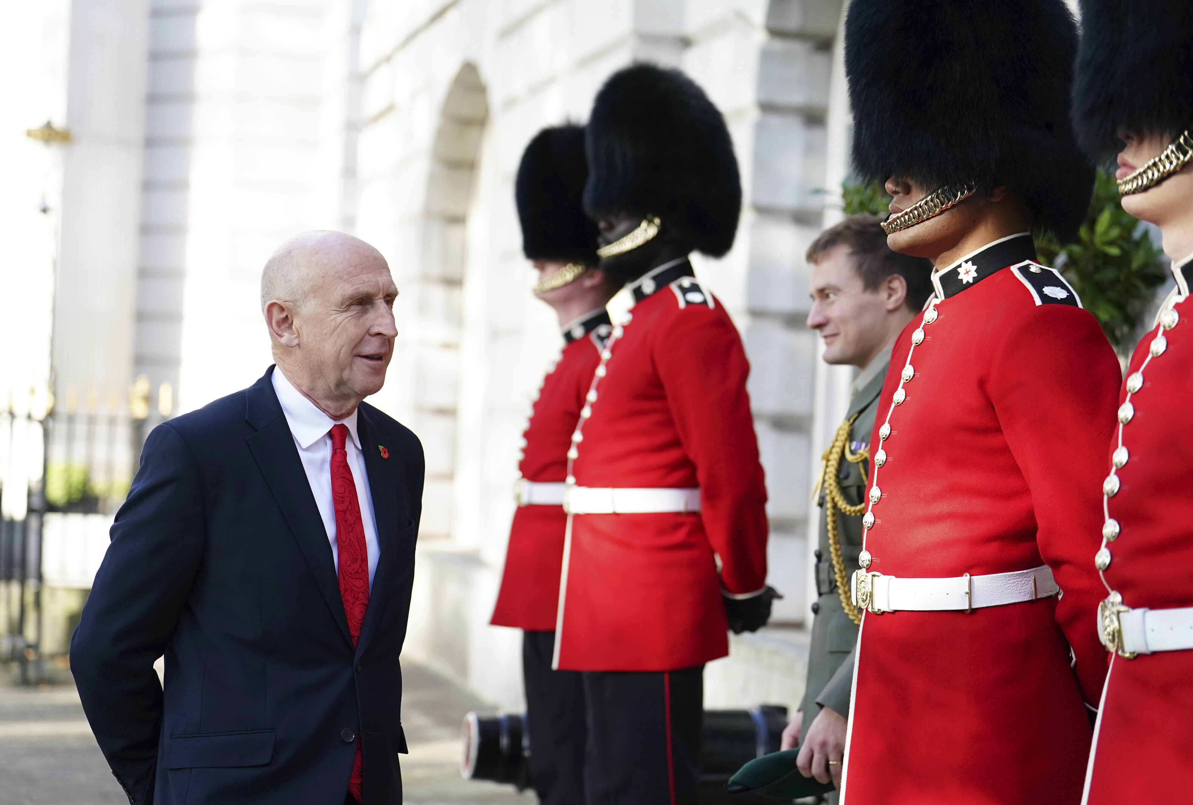 Defence Secretary John Healey speaks to members of the Coldstream Guards before his German counterpart Boris Pistorius arrives to sign a new UK-Germany Defence Agreement at Trinity House in London, Wednesday Oct. 23, 2024. (Jordan Pettitt/PA via AP)