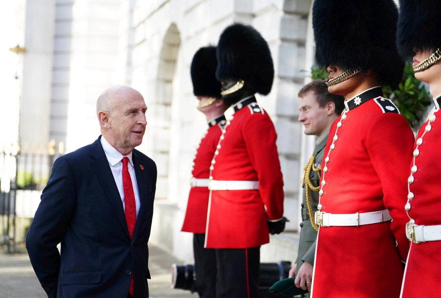 Defence Secretary John Healey speaks to members of the Coldstream Guards before his German counterpart Boris Pistorius arrives to sign a new UK-Germany Defence Agreement at Trinity House in London, Wednesday Oct. 23, 2024. (Jordan Pettitt/PA via AP)