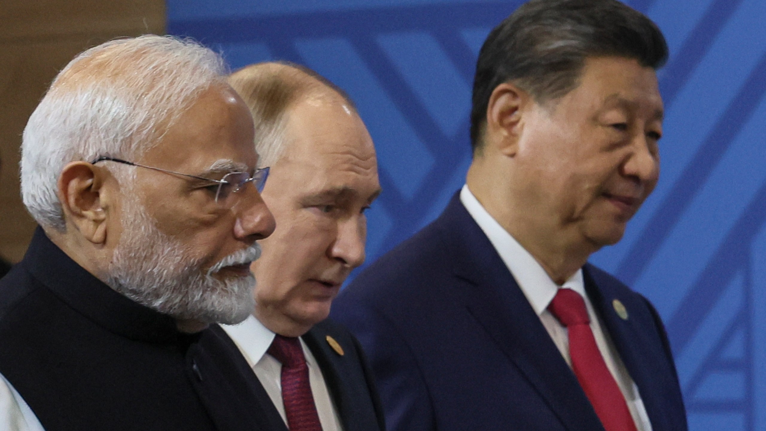 From left: Indian Prime Minister Narendra Modi, Russian President Vladimir Putin and Chinese President Xi Jinping attend a family photo prior to the BRICS Summit plenary session in Kazan, Russia, Wednesday, Oct. 23, 2024. (Maxim Shipenkov, Pool Photo via AP)