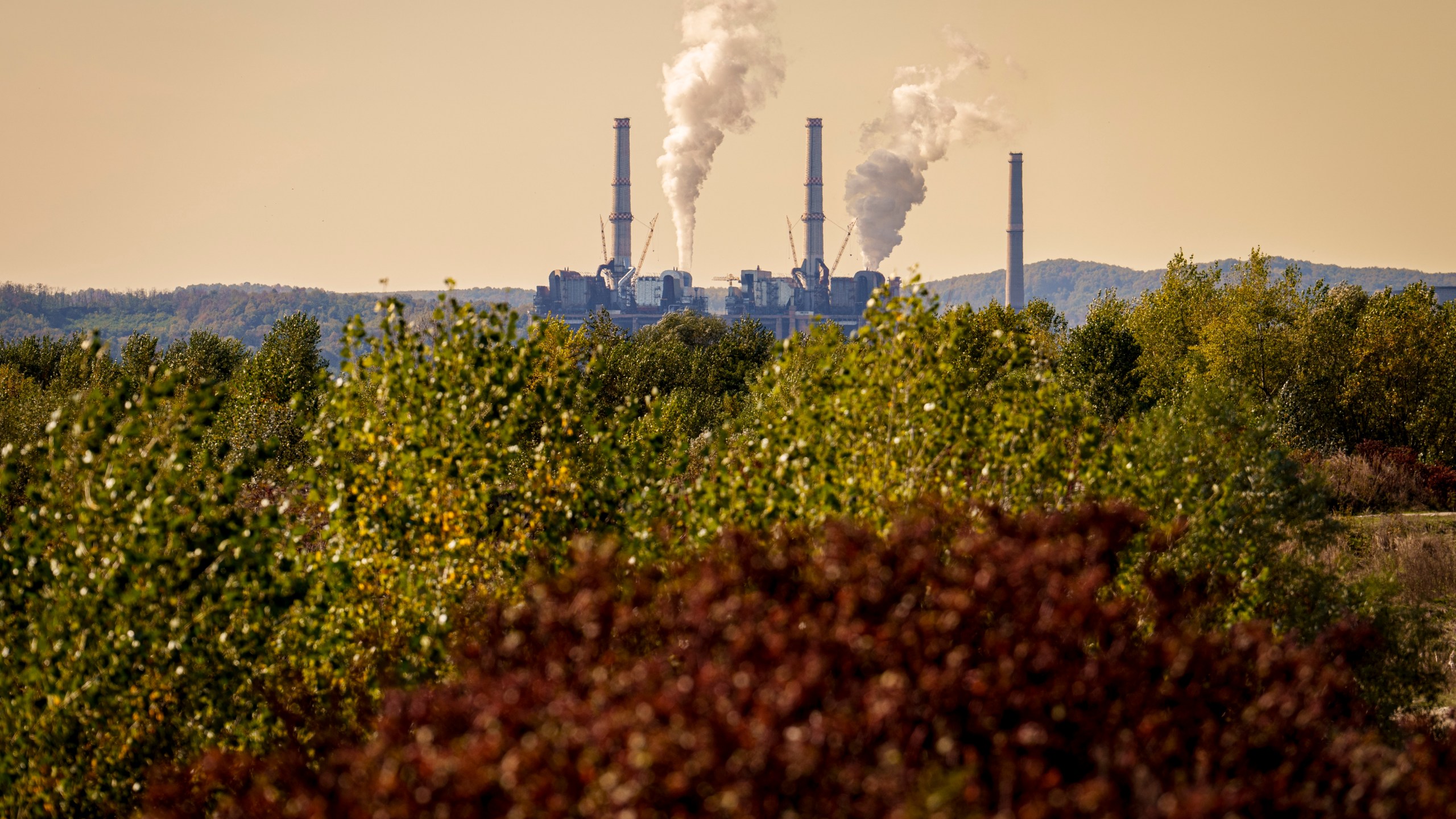 Rovinari, a plant that produces electricity from coal, operates in Rovinari, southern Romania, Friday, Oct. 11, 2024. (AP Photo/Vadim Ghirda)