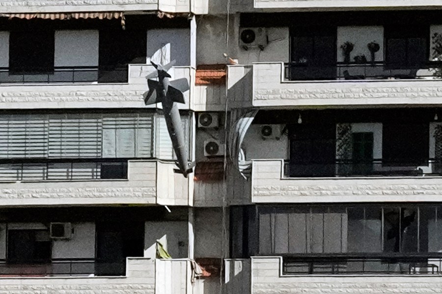 A bomb dropped from an Israeli jet hits a building in Ghobeiri, Beirut, Lebanon, Tuesday, Oct. 22, 2024. (AP Photo/Bilal Hussein)