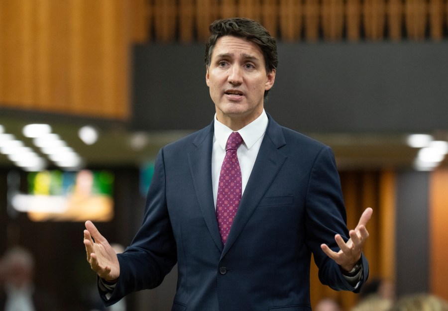 Canada Prime Minister Justin Trudeau rises during Question Period in Ottawa, Tuesday, Oct. 22, 2024. (Adrian Wyld/The Canadian Press via AP)