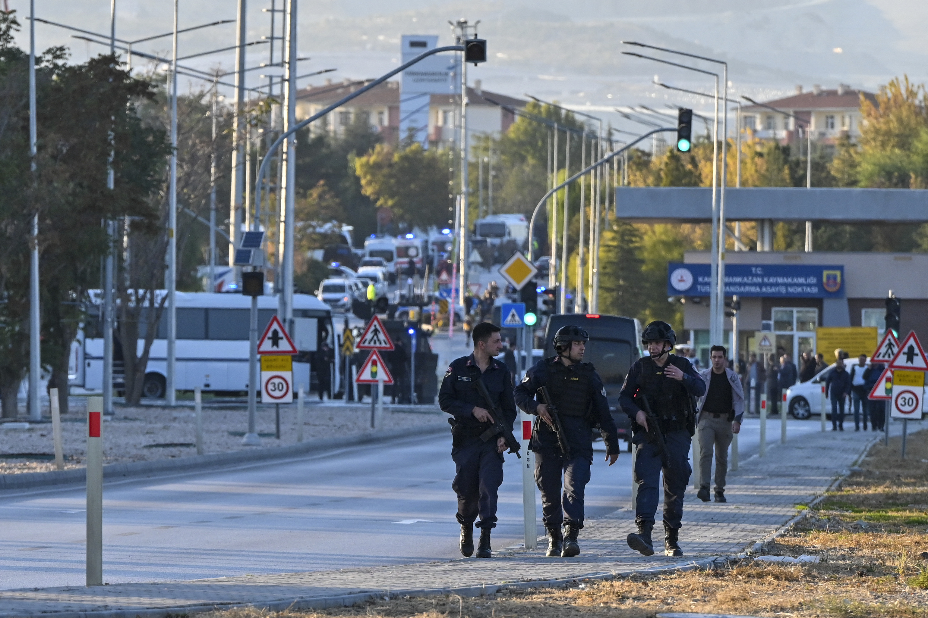 Emergency and security teams are deployed outside of Turkish Aerospace Industries Inc. at the outskirts of Ankara, Turkey, Wednesday, Oct. 23, 2024. (AP Photo)