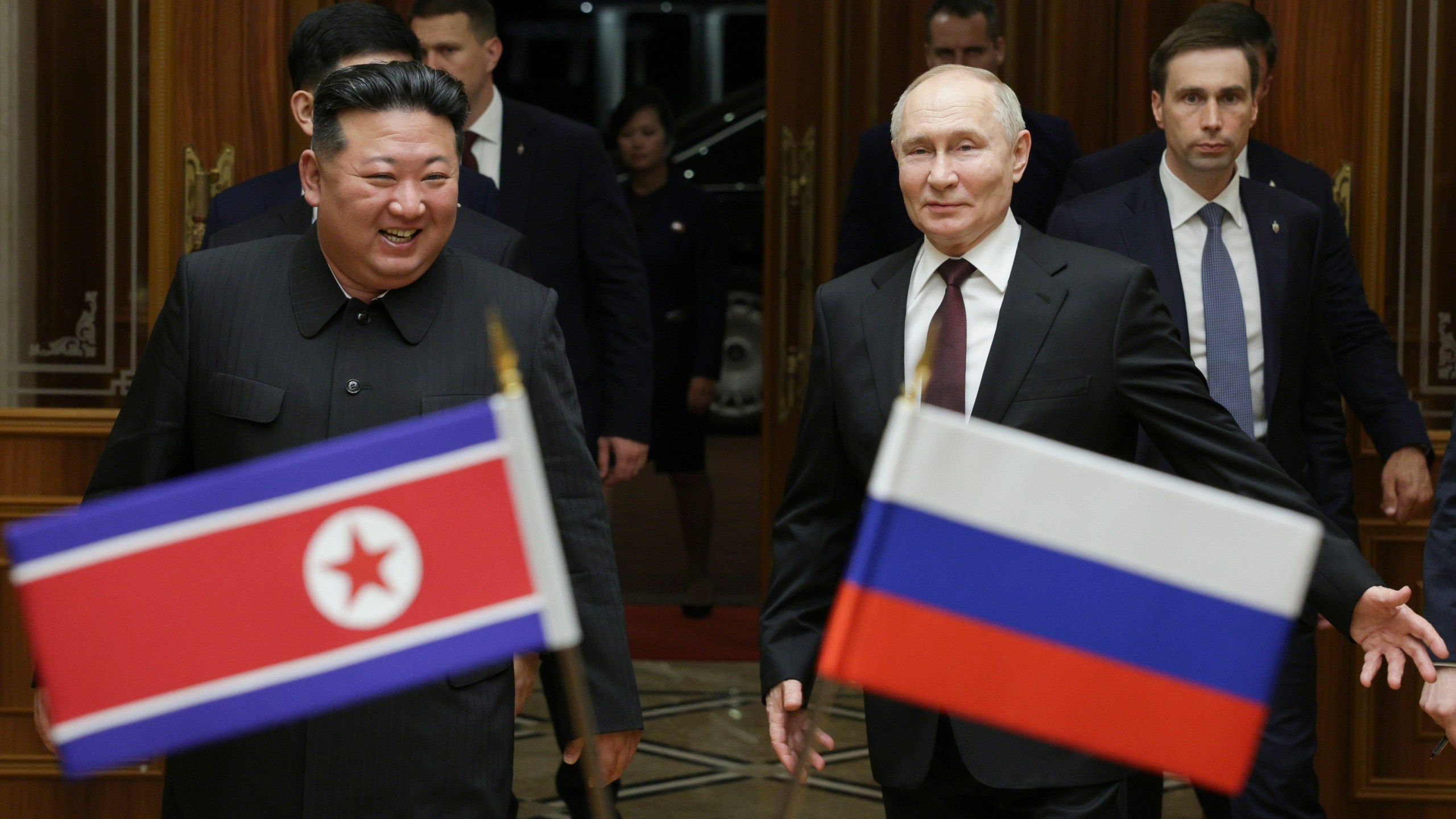 FILE - Russian President Vladimir Putin, right, and North Korea's leader Kim Jong Un smile during their meeting at the Pyongyang Sunan International Airport outside Pyongyang, North Korea, on June 19, 2024. (Gavriil Grigorov, Sputnik, Kremlin Pool Photo via AP, File)