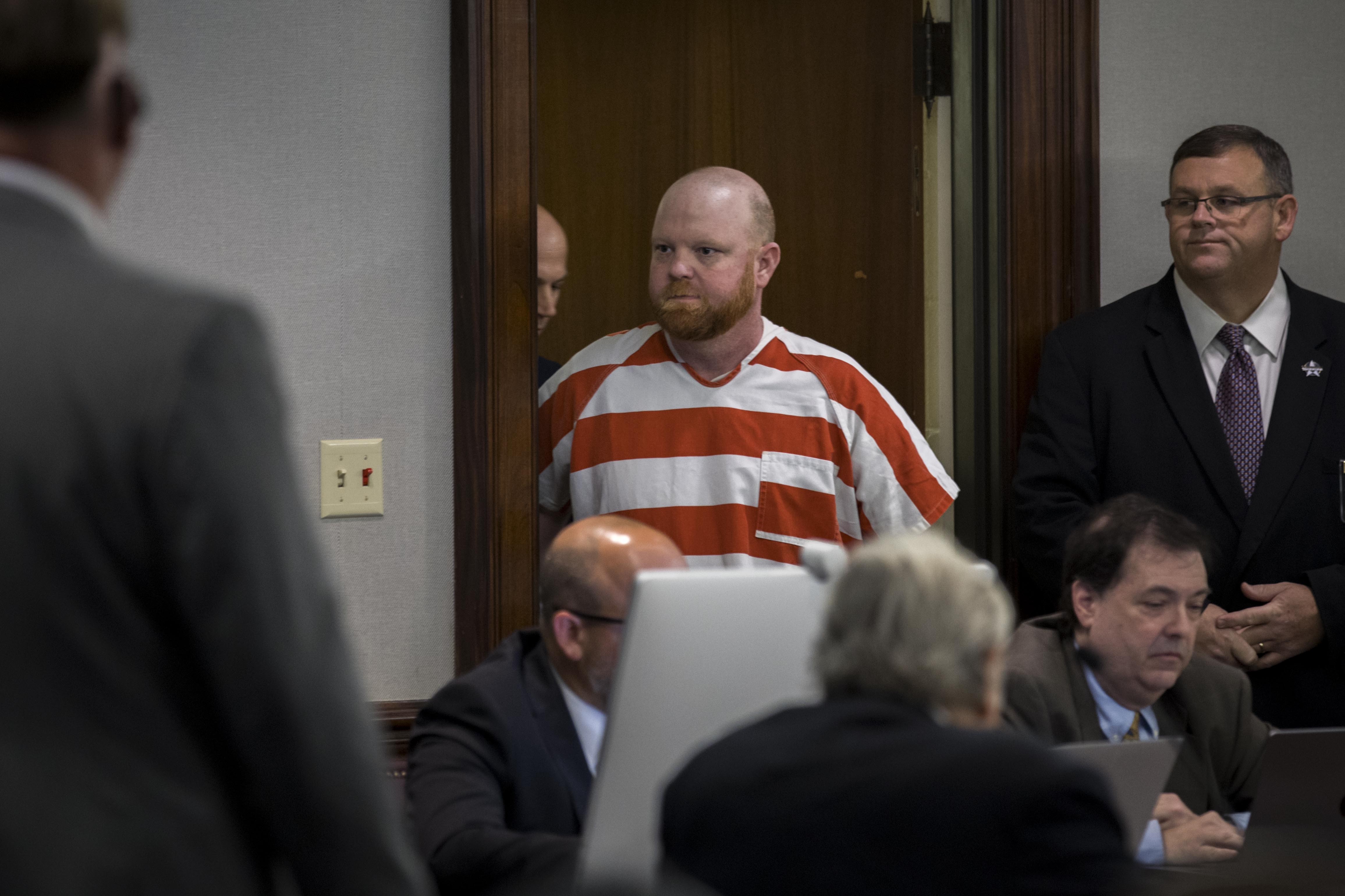 Travis McMichael enters a Glynn County courtroom before a hearing challenging his conviction of killing Ahmaud Arbery in 2020, Thursday, Oct. 24, 2024, in Brunswick, Ga. (AP Photo/Stephen B. Morton)