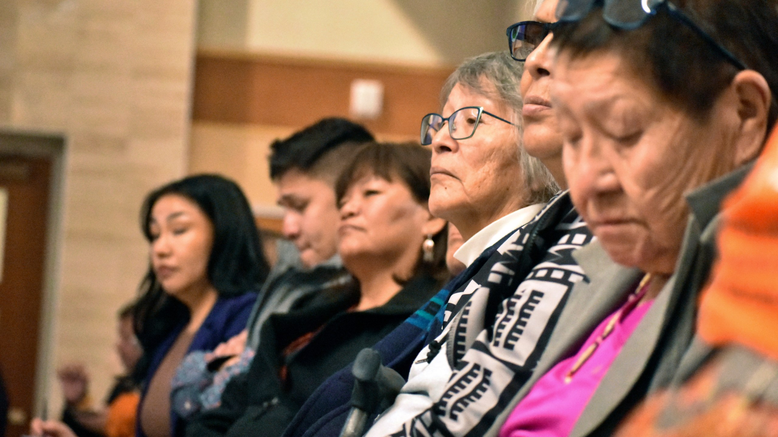 FILE - Elders from the Northern Cheyenne Tribe in southeastern Montana listen to speakers during a session for survivors of government-sponsored Native American boarding schools, in Bozeman, Mont., Nov. 5, 2023. (AP Photo/Matthew Brown, File)