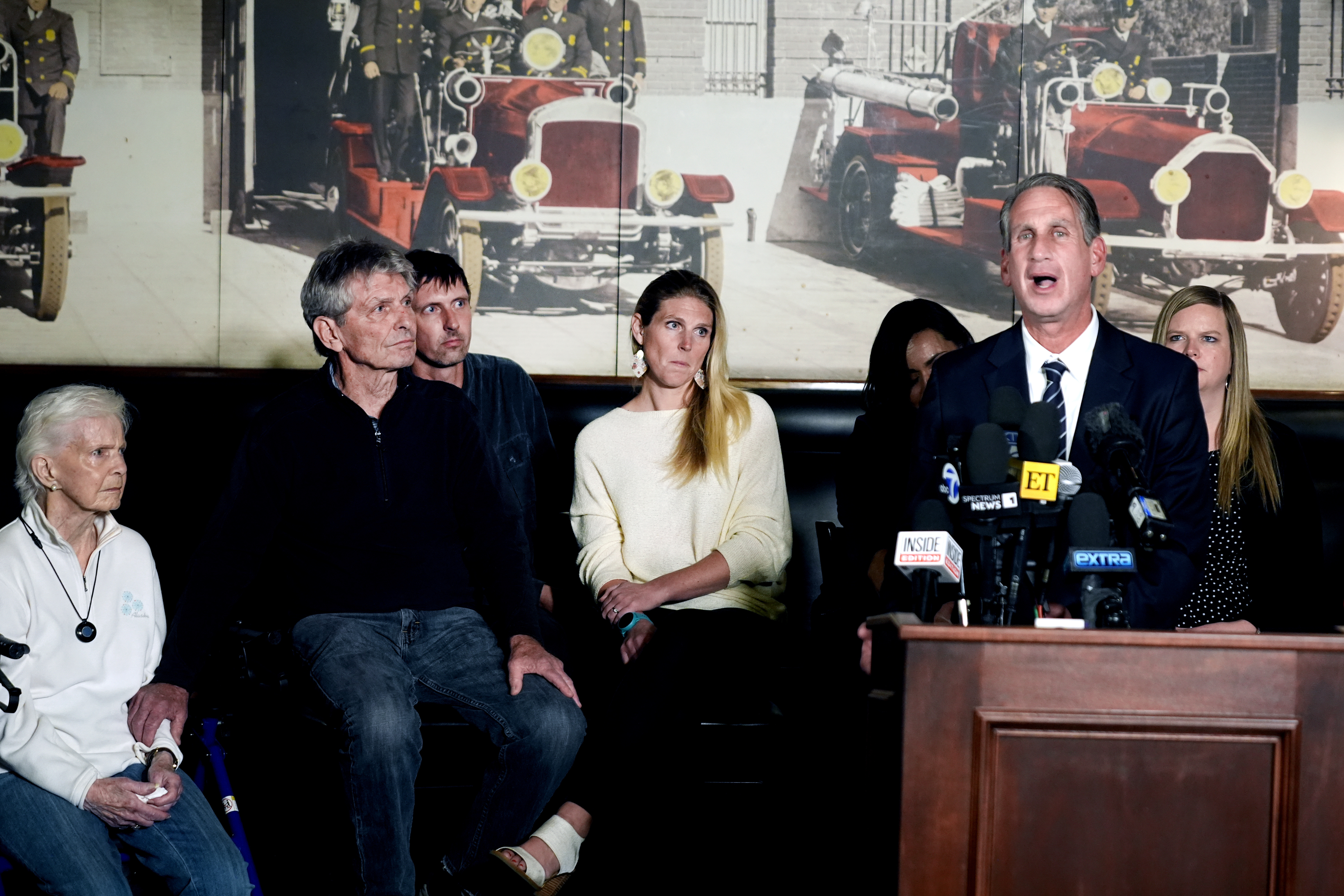 Bryan Freedman Menendez family attorney surrounded by family members talks during a news conference on Thursday, Oct. 24, 2024, in Los Angeles. (AP Photo/Damian Dovarganes)