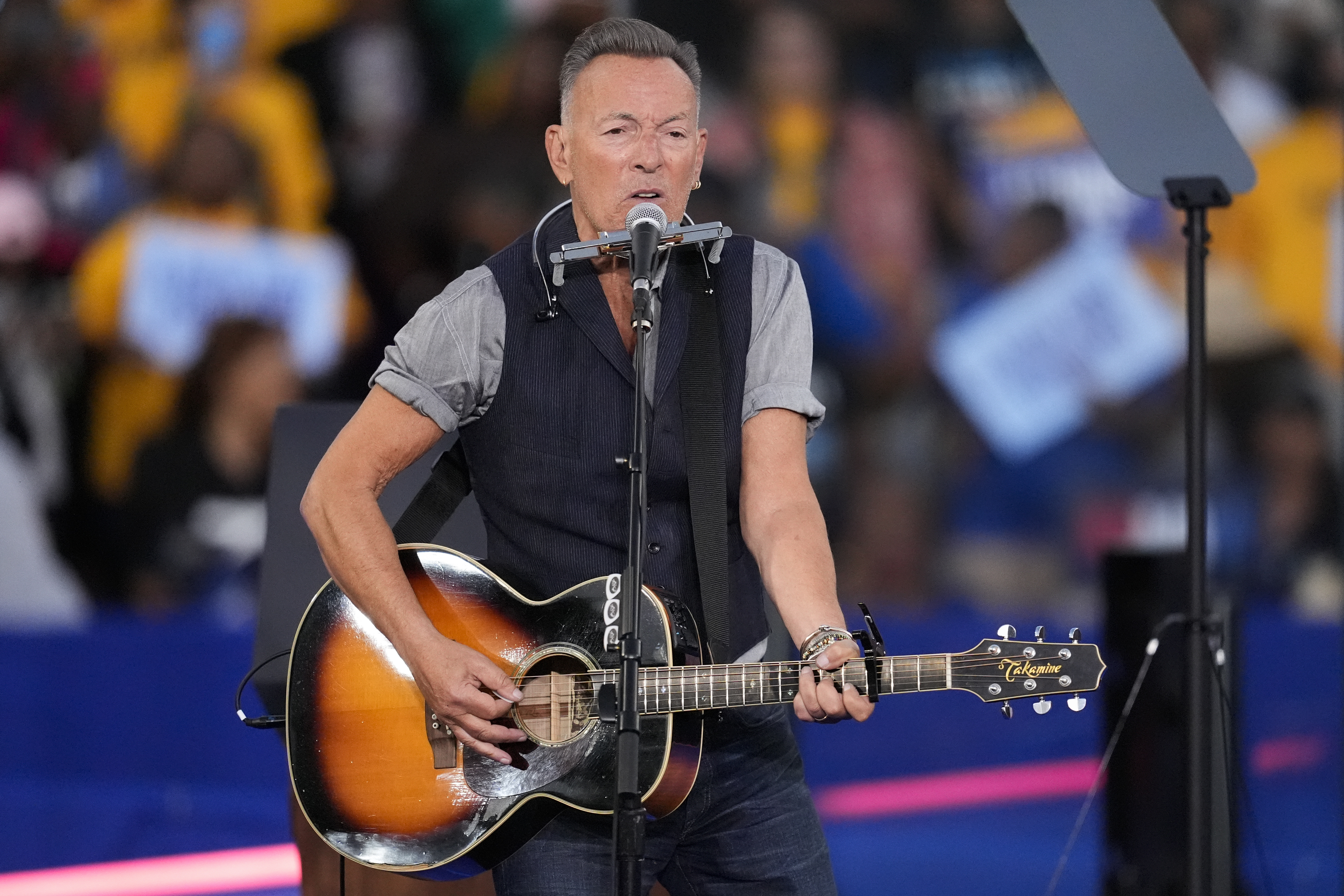 Bruce Springsteen performs at a campaign rally supporting Democratic presidential nominee Vice President Kamala Harris, Thursday, Oct. 24, 2024, in Clarkston, Ga. (AP Photo/Mike Stewart)