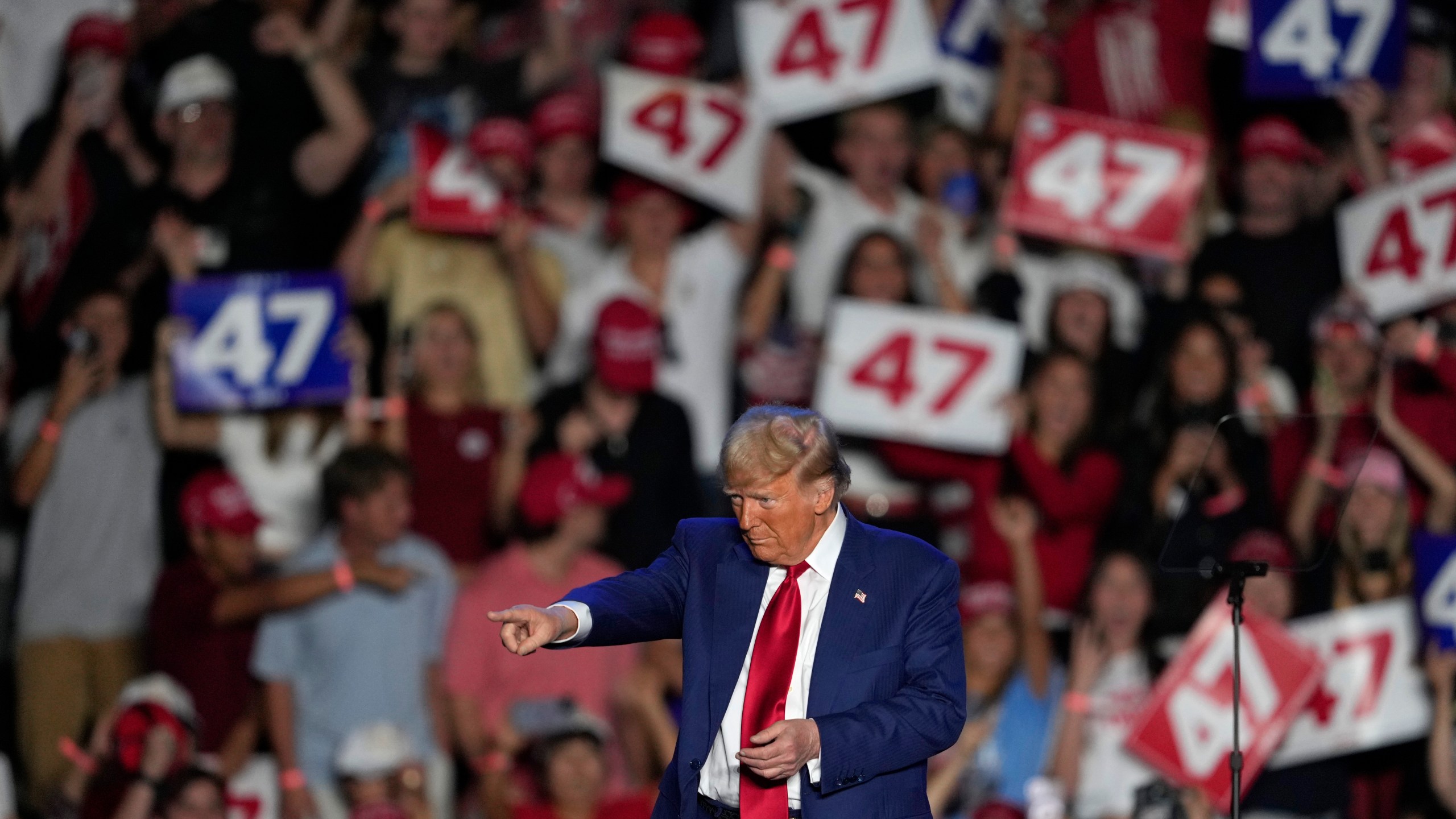 Republican presidential nominee former President Donald Trump departs after speaking at a campaign event at Mullett Arena, Thursday, Oct. 24, 2024, in Tempe, Ariz. (AP Photo/Matt York)